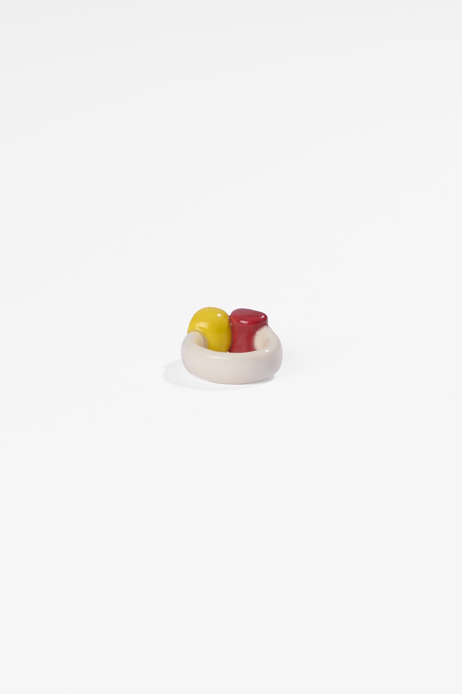 Manon van Kouswijk, Rings for Found Hands (red, yellow, black and white), porcelain, dimensions vary per ring, 2026, $590 each. Photography: Ross Coulter