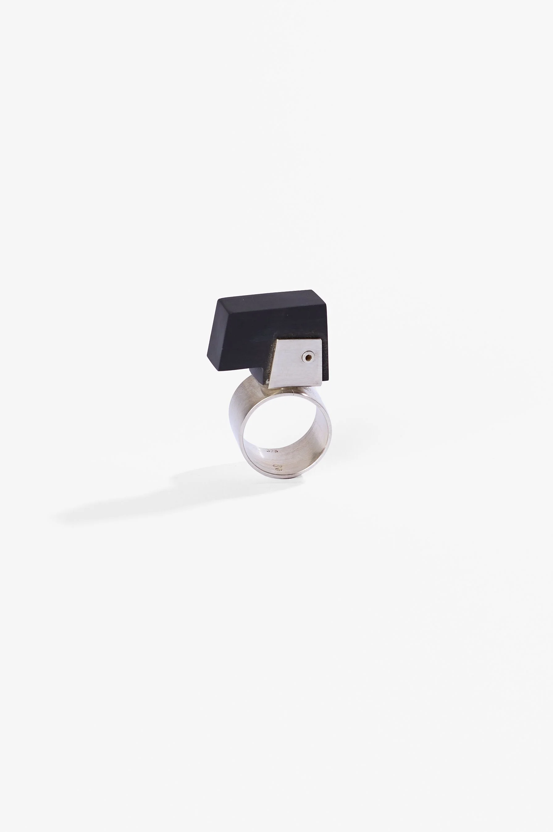 Anke Kindle, Eichinger Ring, dark charcoal grey synthetic stone, sterling silver, 2023, $650. Photography: Ross Coulter