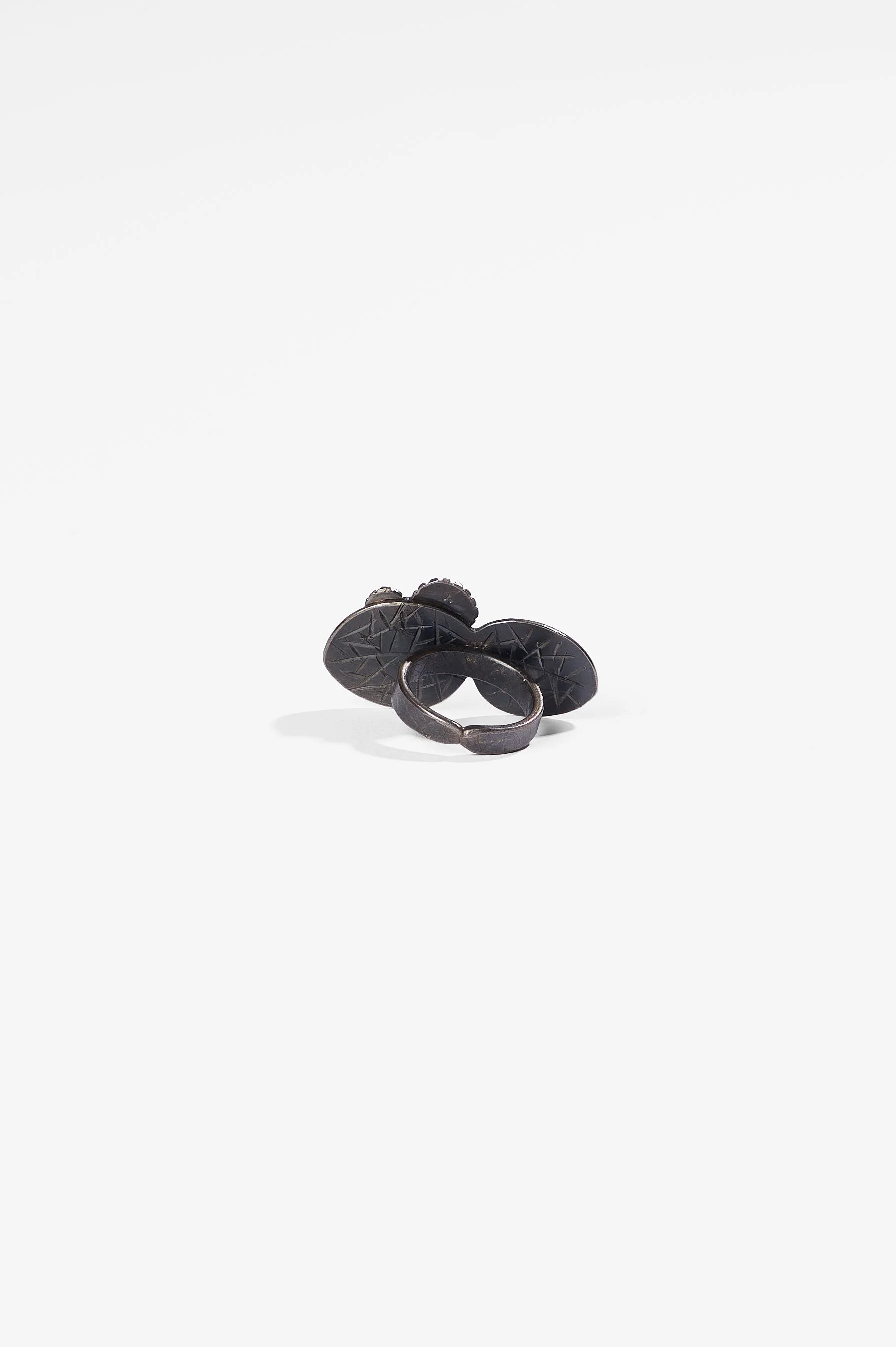 Yuko Fujita, Pressed Flower series, Daisy and leaf‚ size M+, approx. 2.2 x 4.0 cm, sterling silver, enamel paint and pure gold leaf on enamel paint (please note paints will, and are intended to, fade over time to take on a new appearance), $2,300. Ph