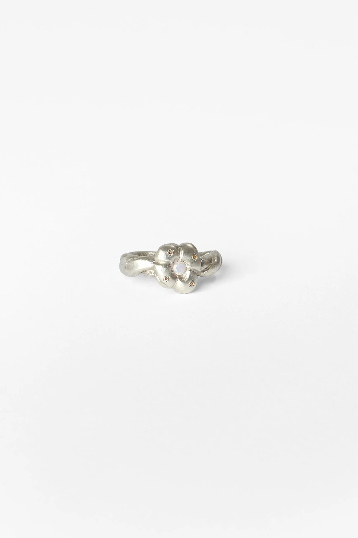 2. Audrey Tan, ‘royal clover’, 2026
recycled sterling silver, lab grown corundum, glass, approx. size L. Price: $450
