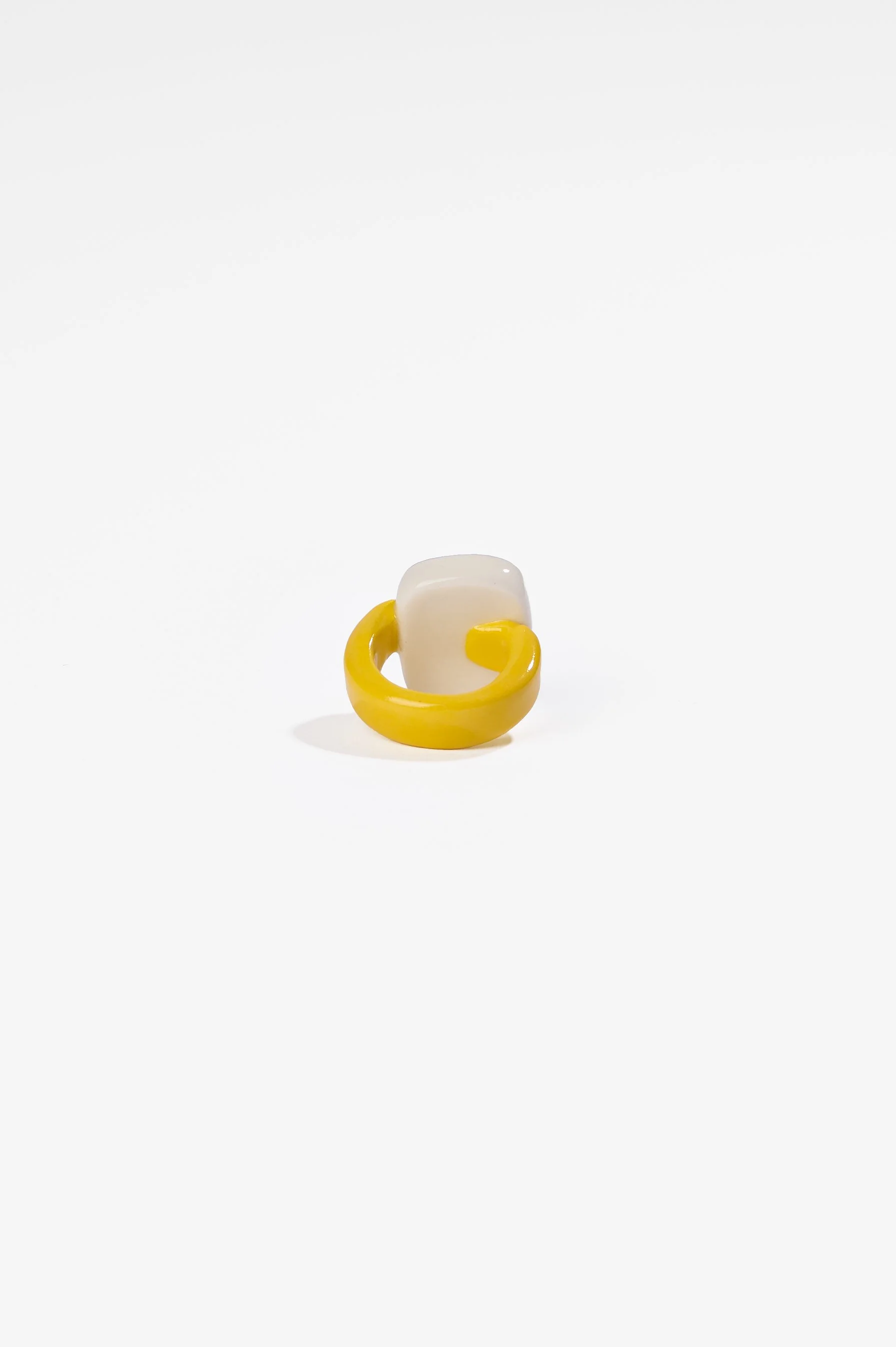 Manon van Kouswijk, Rings for Found Hands (yellow, black and white), porcelain, dimensions vary per ring, 2026, $590 each. Photography: Ross Coulter