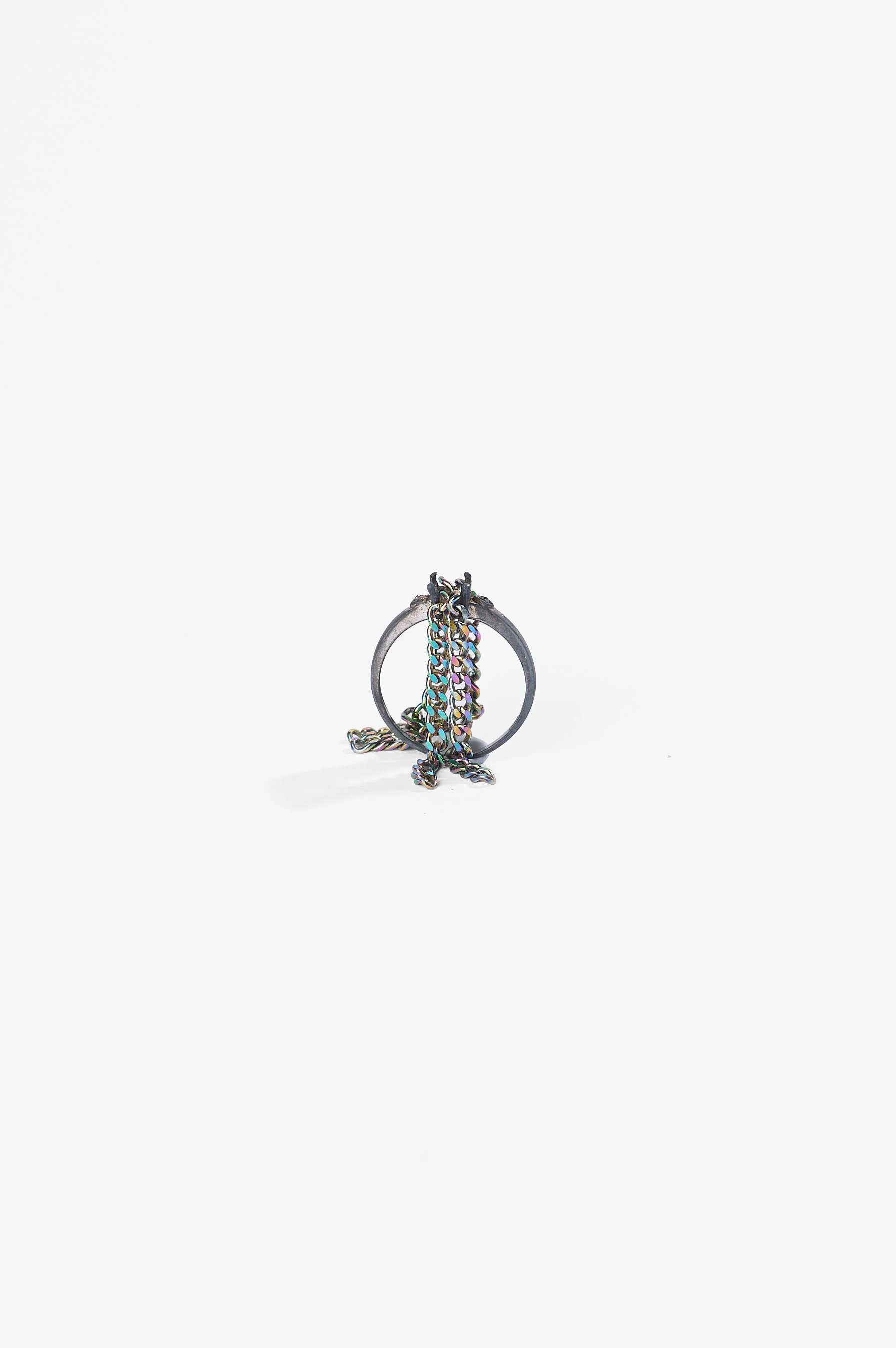 Debris Facility, Capsule Collapsing, oxidised silver, surgical stainless steel, aluminium, 3D printed nylon, anodised stainless steel, printed acetate, mirror frame, acrylic display, acrylic paint, iridescent pigment, 2026. Metal rings $365 each. Pho