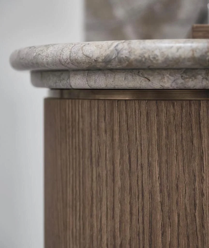 texture in interior design including wood, marble and brushed metal