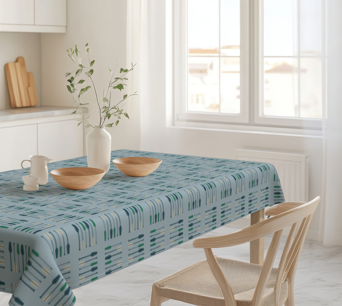 Image of light blue table cloth with shoreline strokes pattern