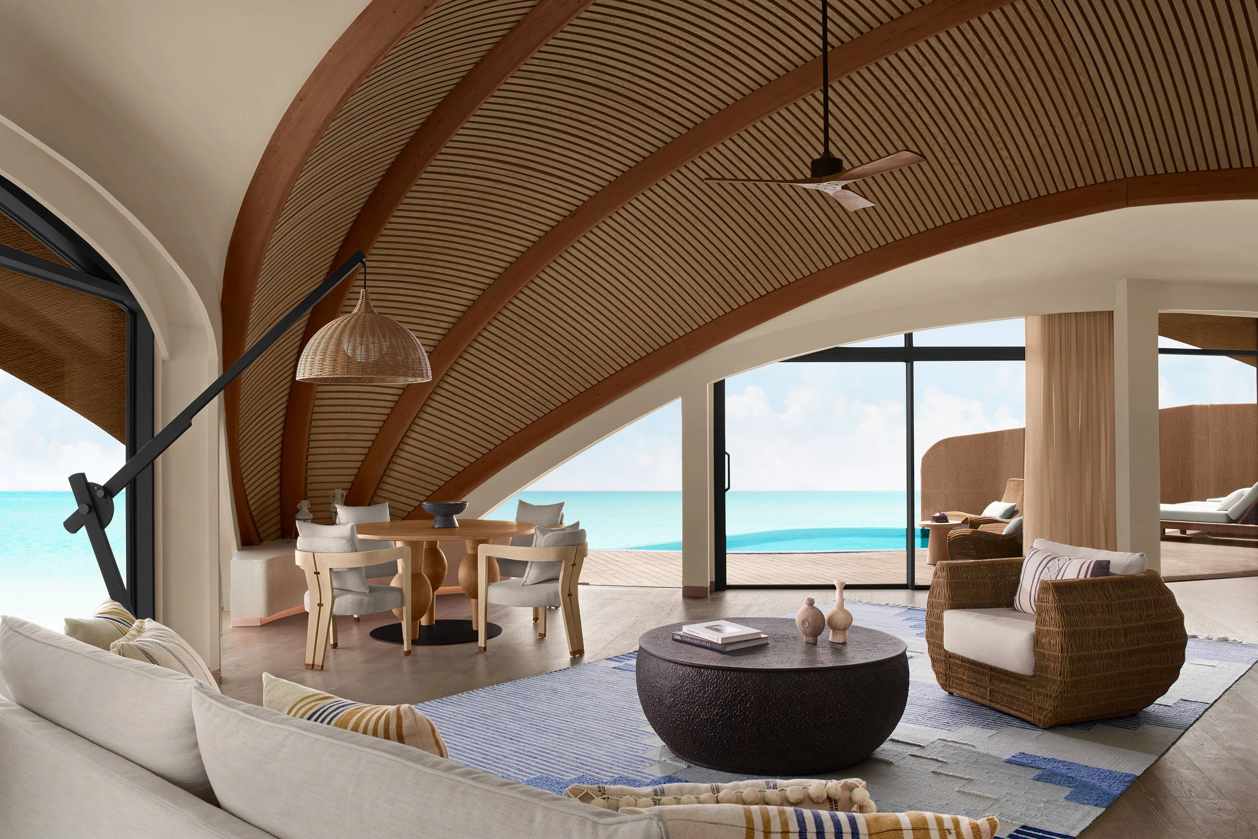 Nujuma - Two Bedroom Overwater Villa - living room.jpg
