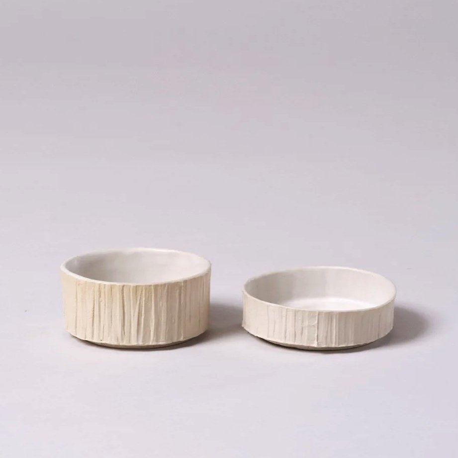 Cream textured slipcast contemporary Brutalist inspired stackable ceramic dishes