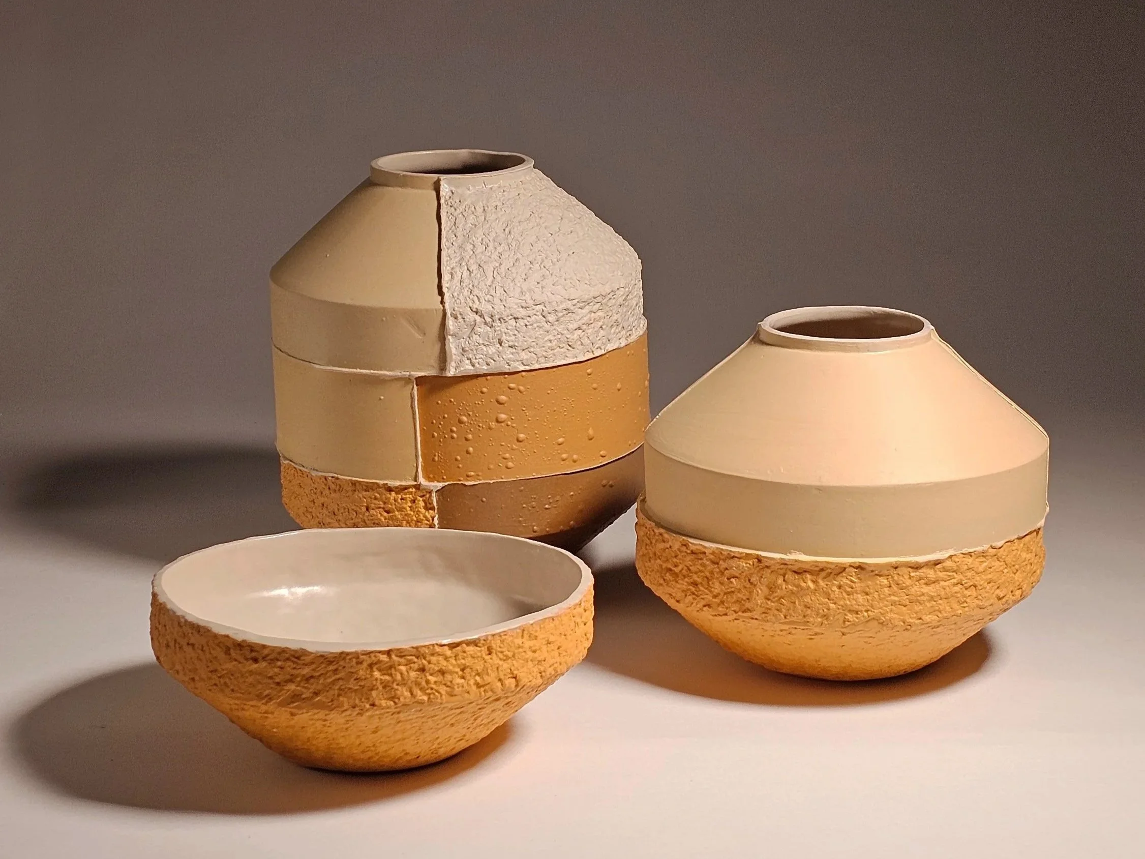 Collection of three ceramic vessels