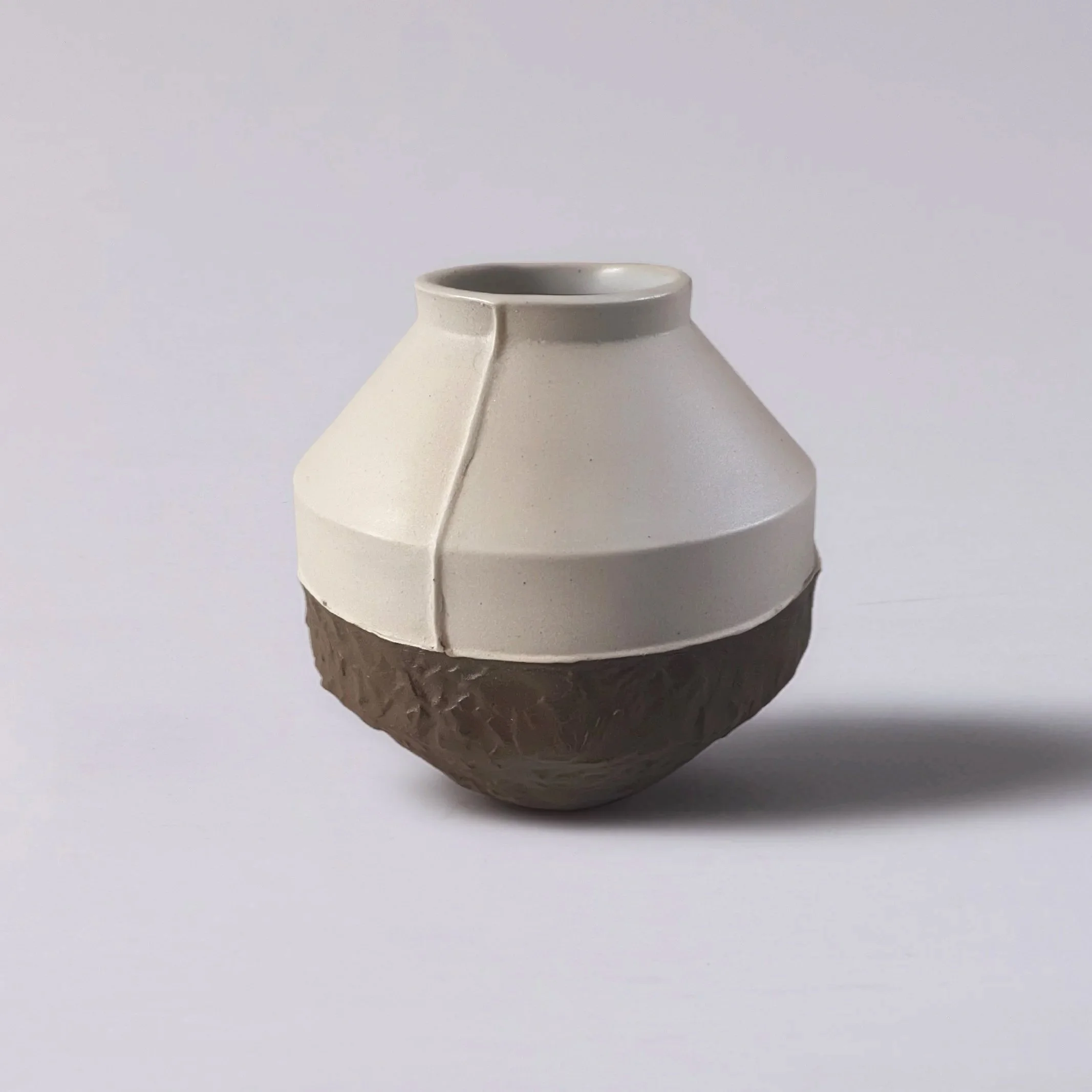 Brown and cream slipcast contemporary Brutalist inspired ceramic vessels