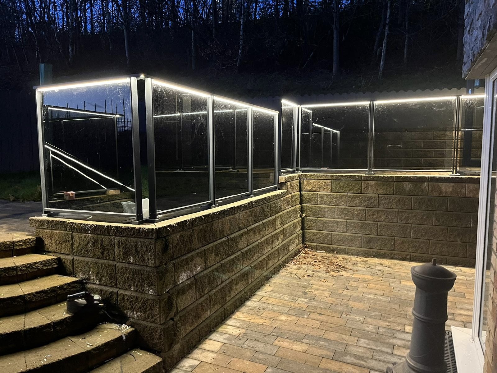 Garden Oasis with a Glass Balustrade
