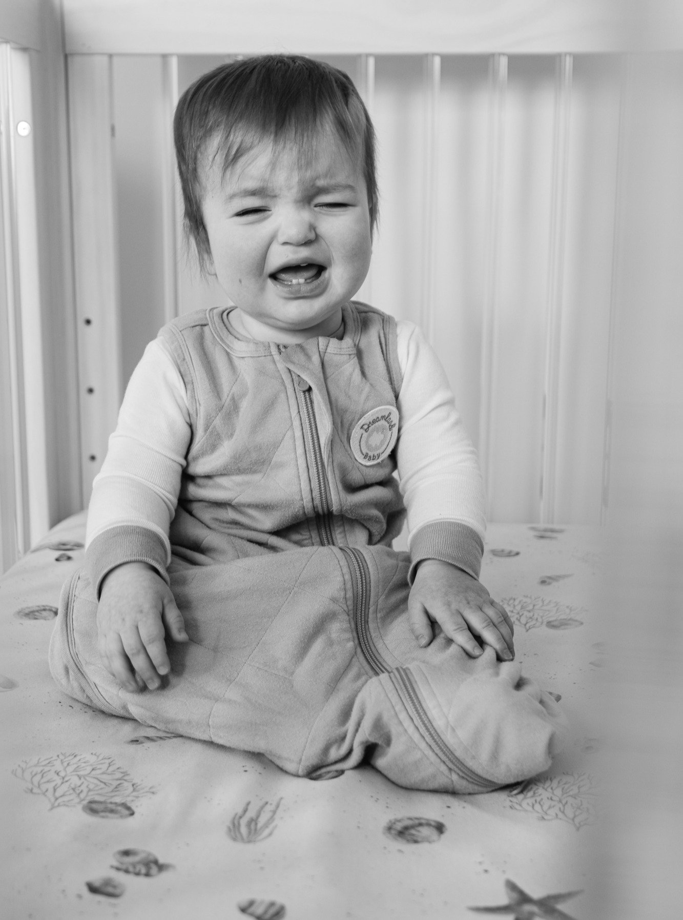 Our lives aren&rsquo;t picture perfect, and our memories don&rsquo;t have to be either.

This photo of Eli, teary and tired in his crib, reminds me of that.
I don&rsquo;t just want to capture the smiles and the sunshine &mdash; I want to remember the