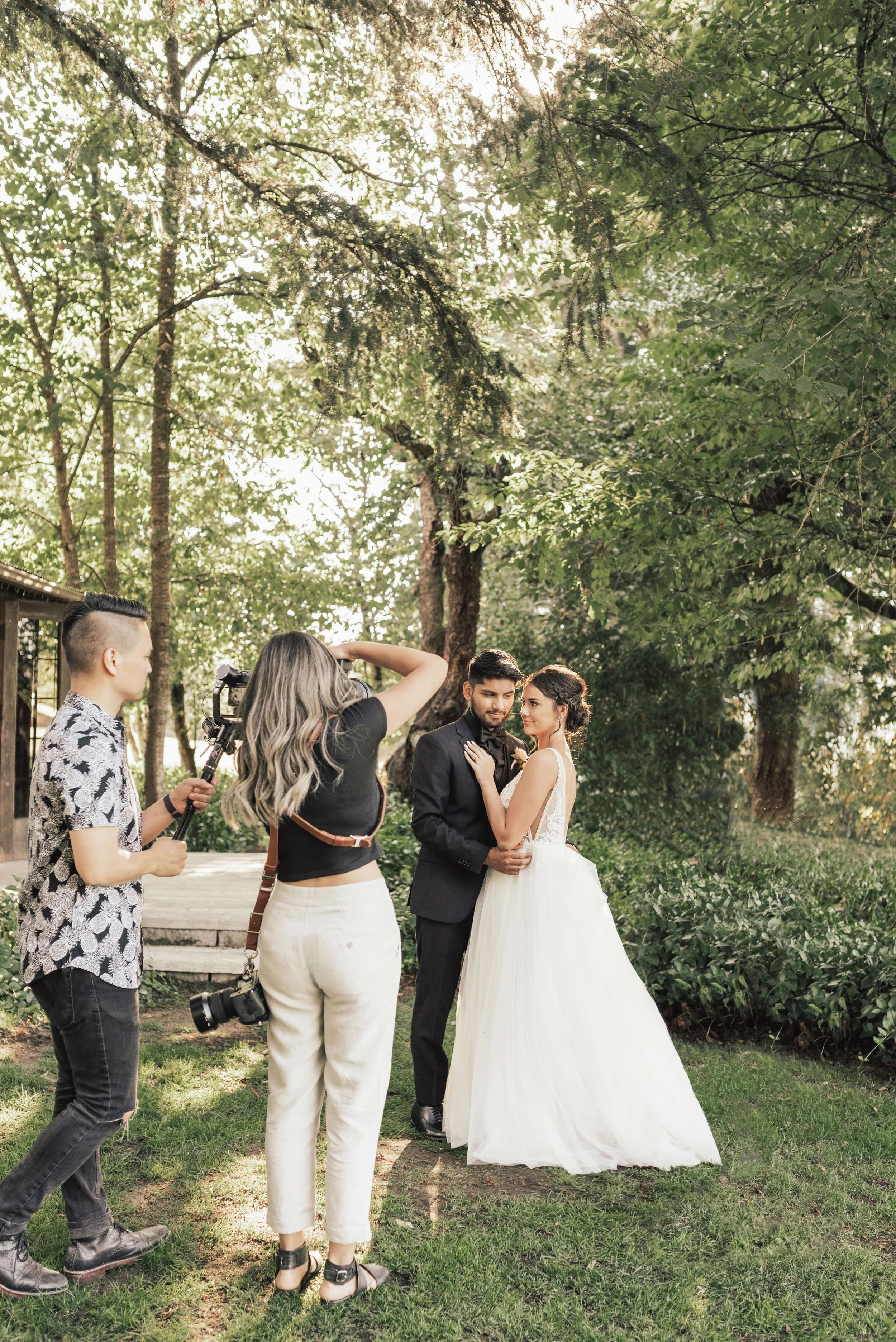 Seattle husband and wife photographing newlywed couple