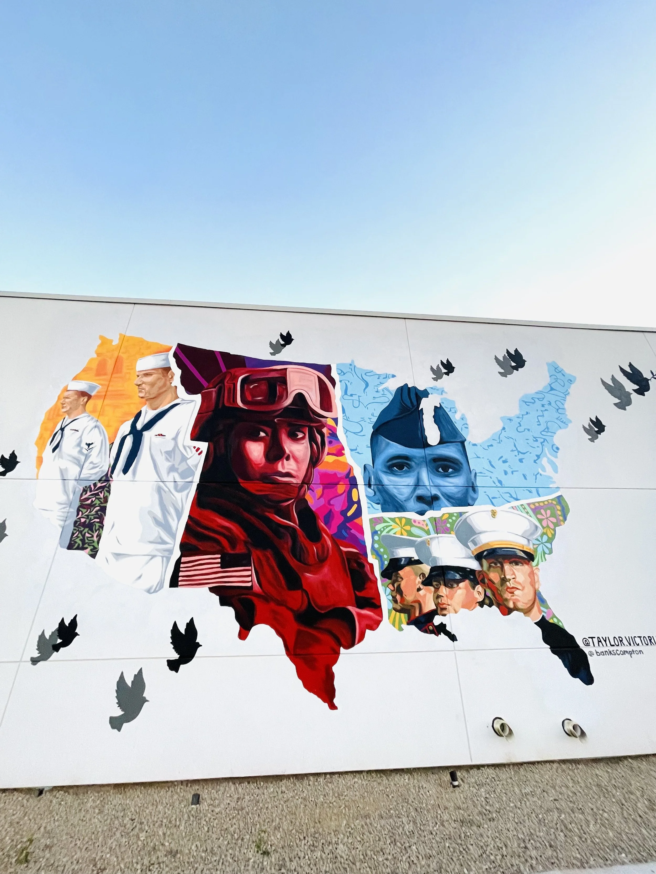 Black Rifle Coffee Company mural in Mesa, Arizona, featuring military figures painted by Banks Compton while assisting lead artist Taylor Nelson.