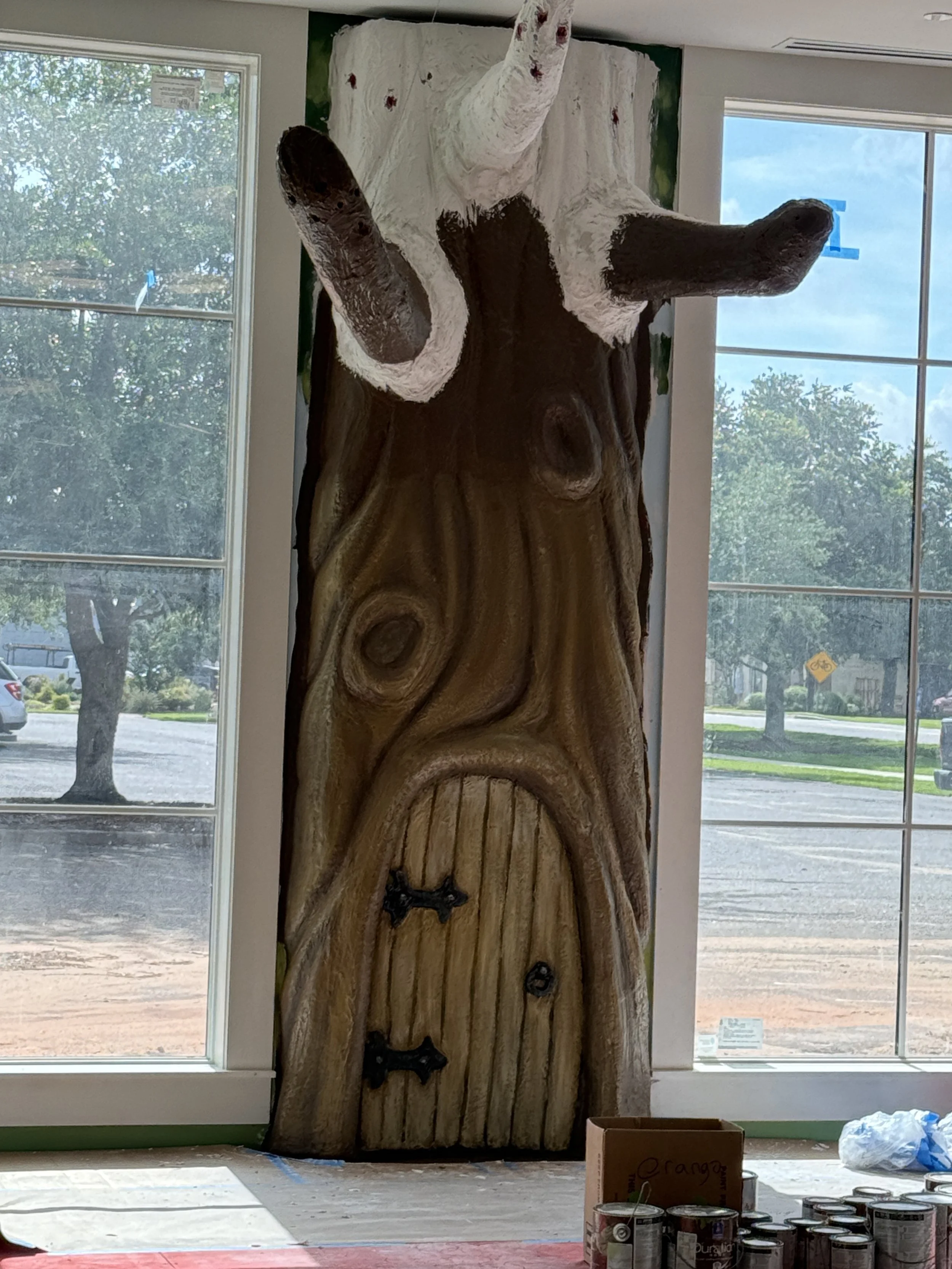 Sculptural reading tree at Foley Community Library during Banks Compton's painting and finishing process.