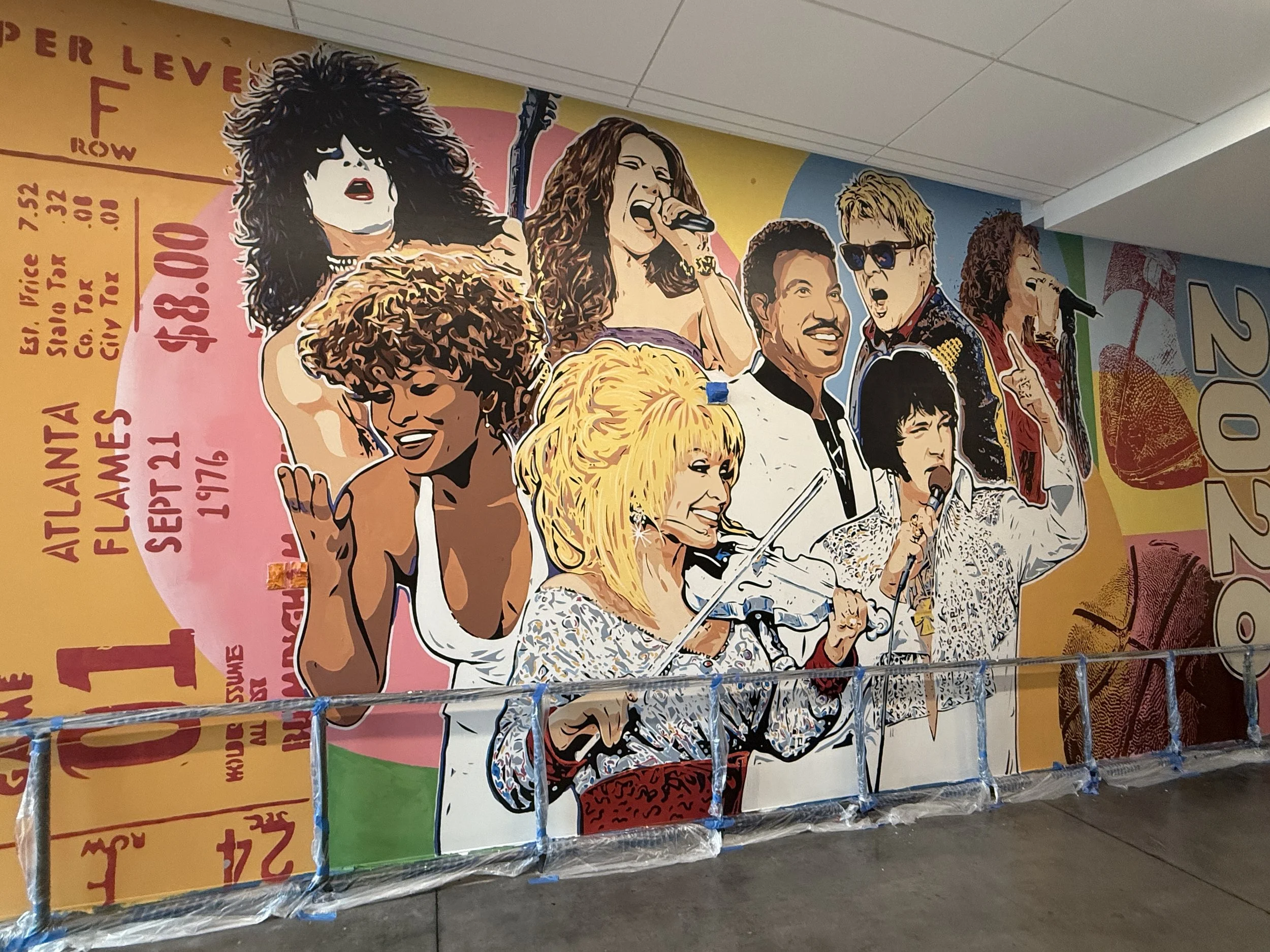 Large-scale Legacy Arena mural by Banks Compton at the BJCC in Birmingham, Alabama, celebrating 50 years of music and entertainment.