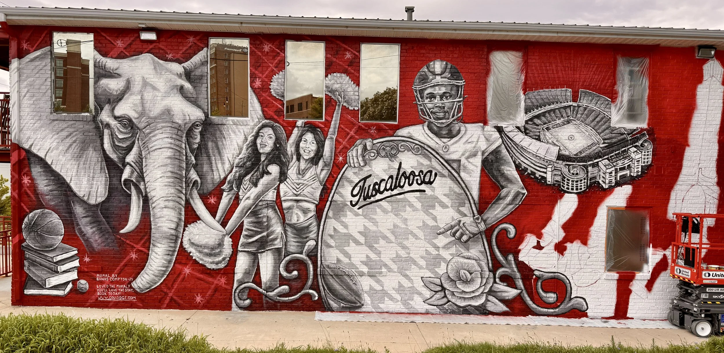 Large Alabama football mural at Collodge in Tuscaloosa featuring an elephant, cheerleaders, football player, Bryant-Denny Stadium and Denny Chimes