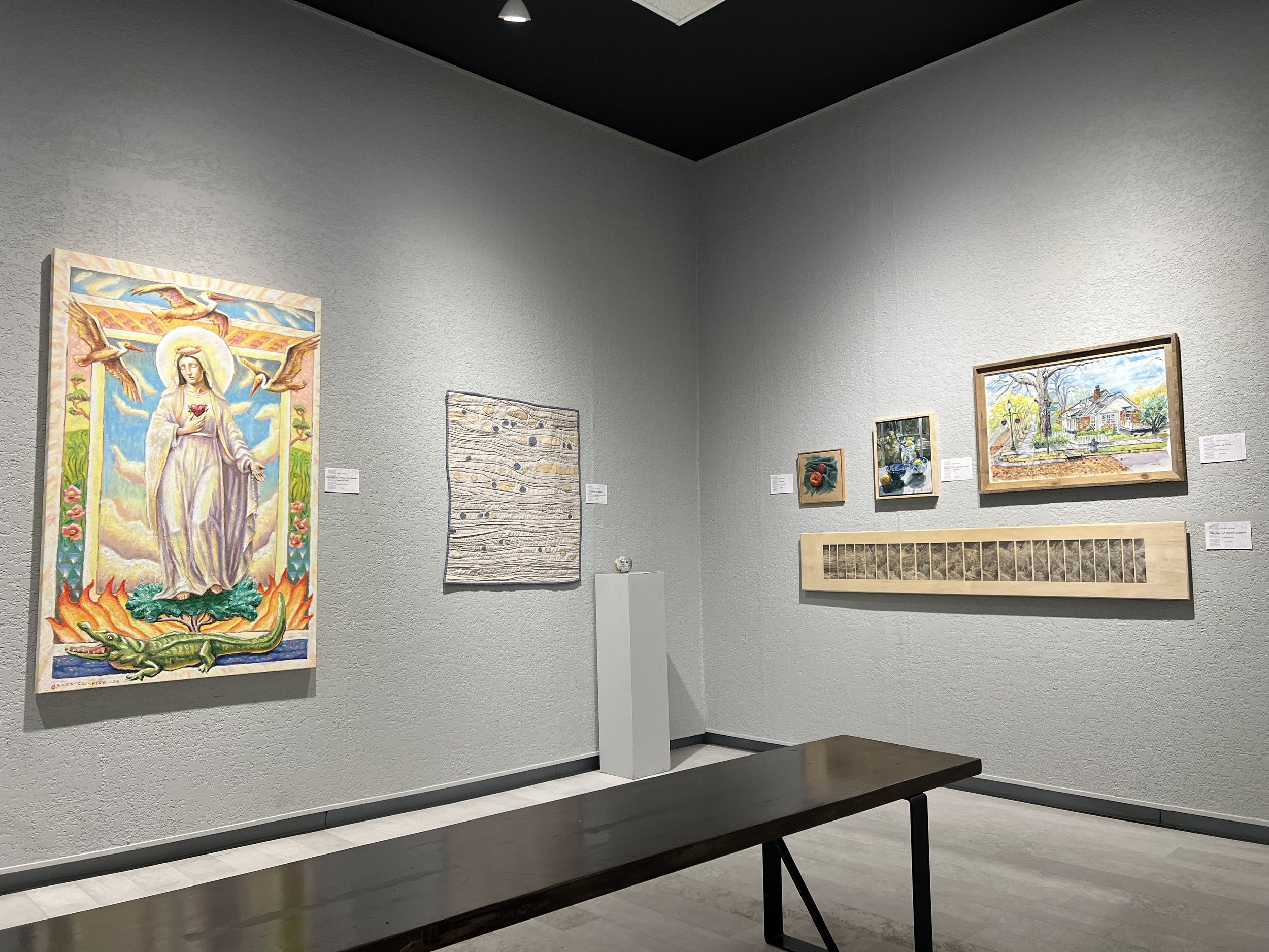 Installation view of the 52nd Annual Bi-State Competition and Exhibition at the Meridian Museum of Art in Meridian, Mississippi, featuring artwork by Banks Compton.