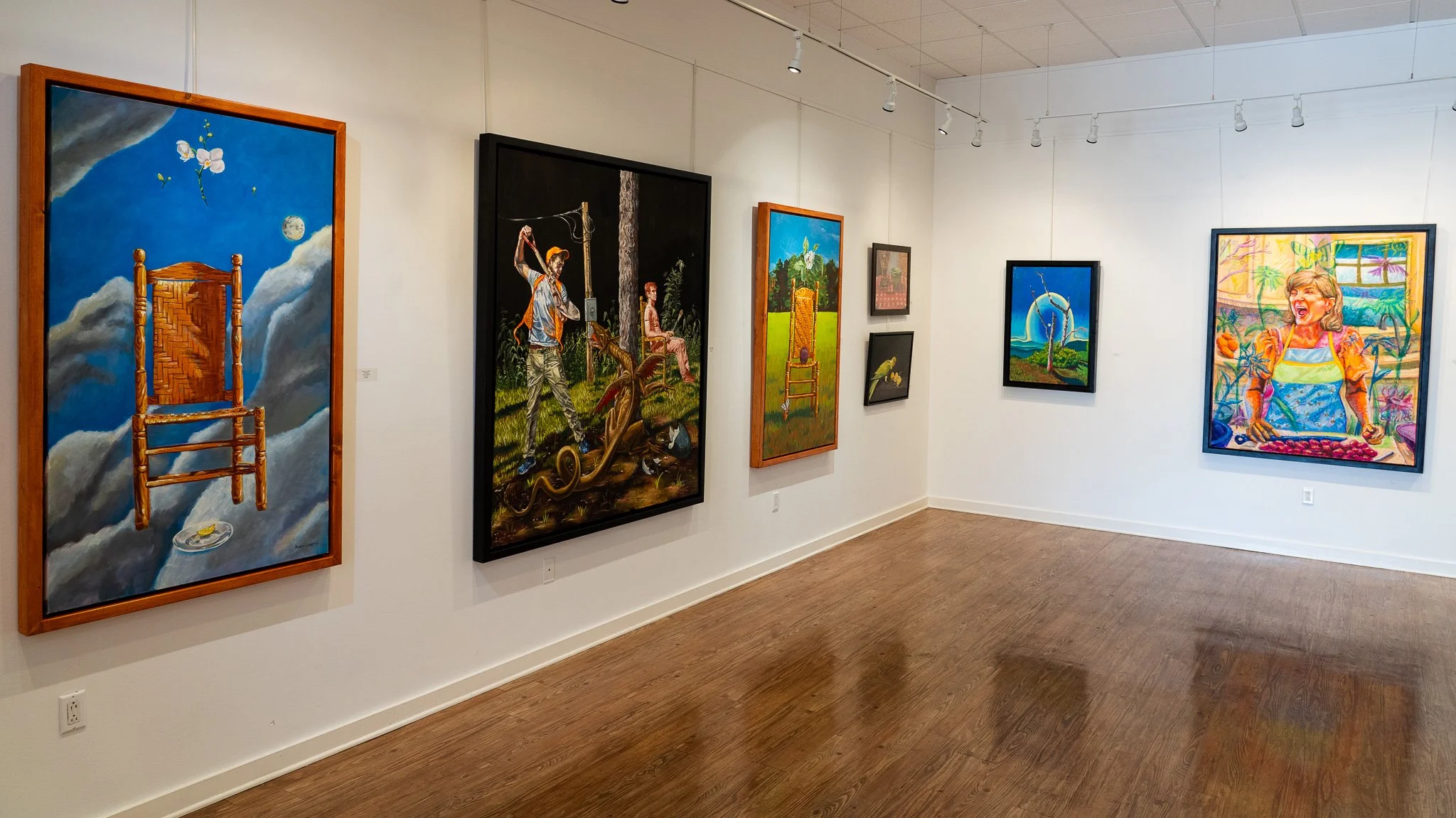 Paintings by Alabama artist Banks Compton displayed in the Southern Spirits exhibition at the Eastern Shore Art Center.