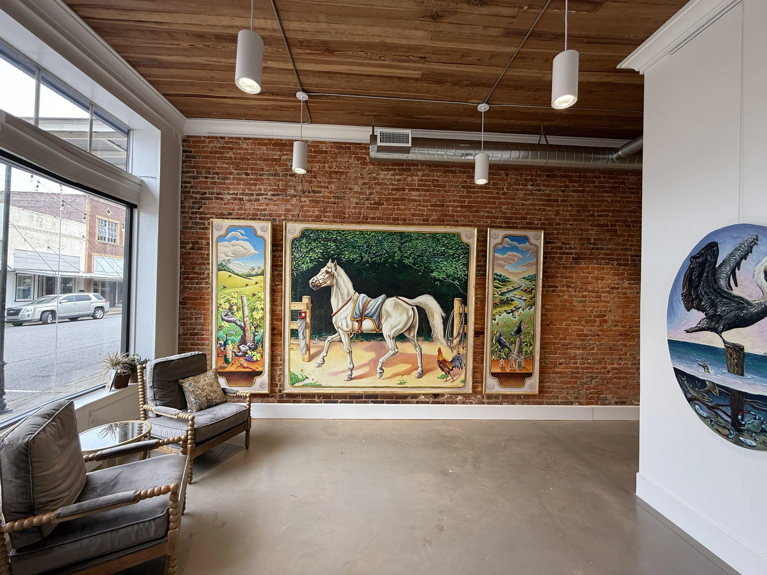 Permanent collection of paintings by Alabama artist Banks Compton displayed inside the Chanticleer Center in downtown Demopolis, Alabama.