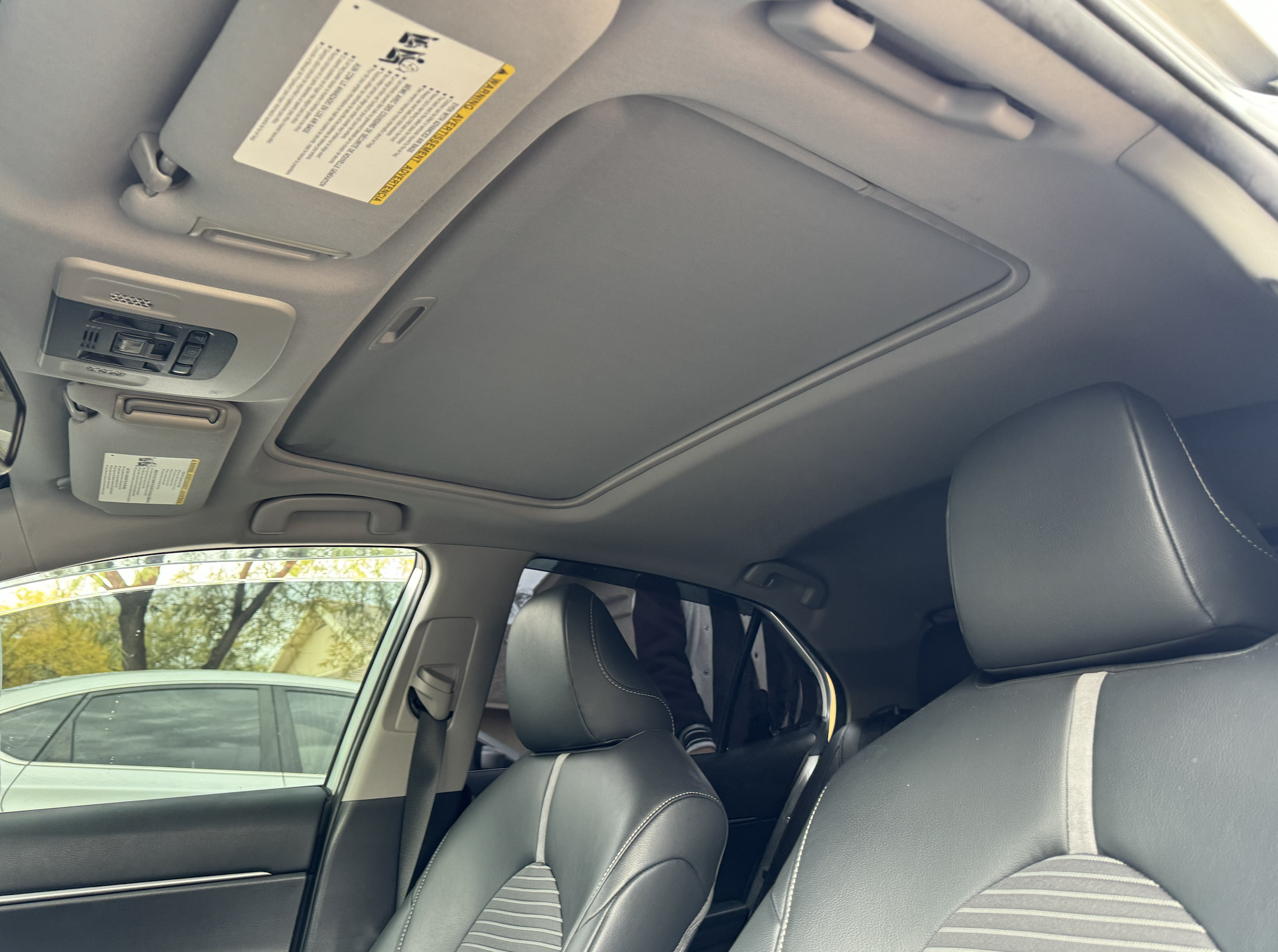 2019 Toyota Camry Interior before suede restoration. Services completed by Tucson Arizona business Milky Way Interiors.
