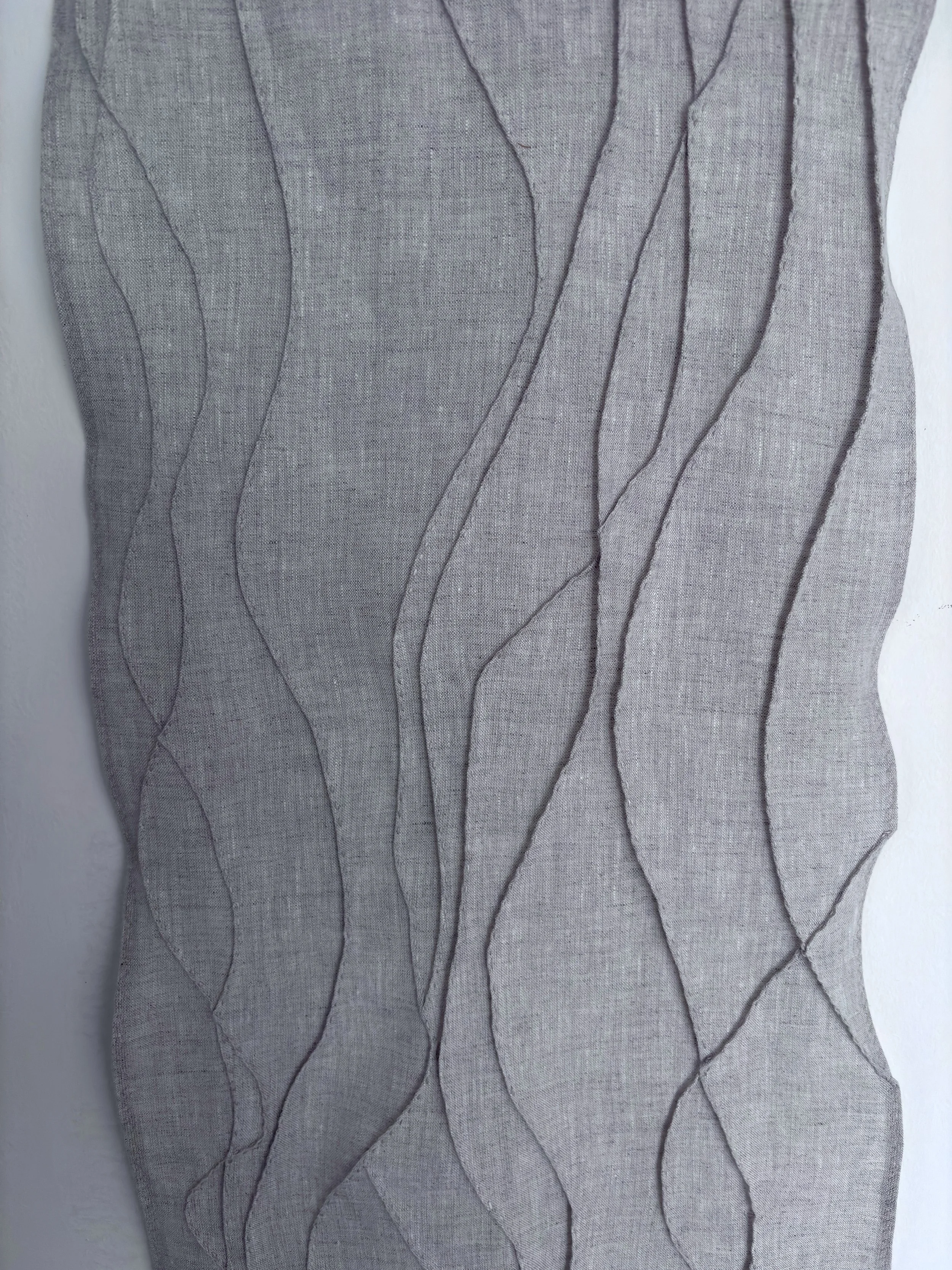 Rill marks are the dendritic, braided streams that form by water draining back to the sea at low tide, carving delicate erosional patterns in the sand, like memory and lived experience carve new neural pathways in the brain.