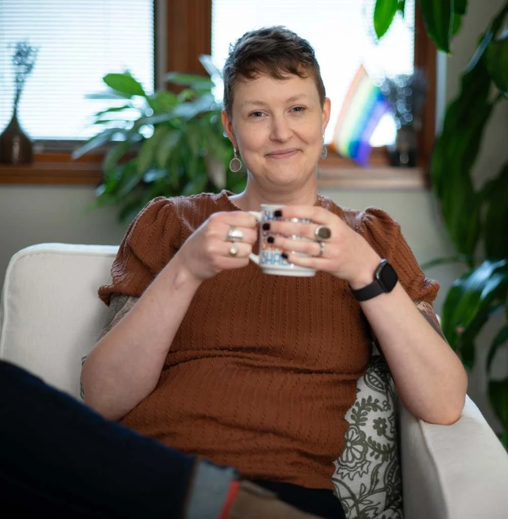 photo of marie selleck holding a coffee