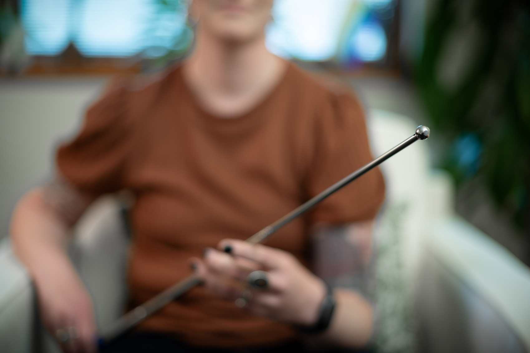 a photo of marie selleck holding a pointer that is used in brainspotting