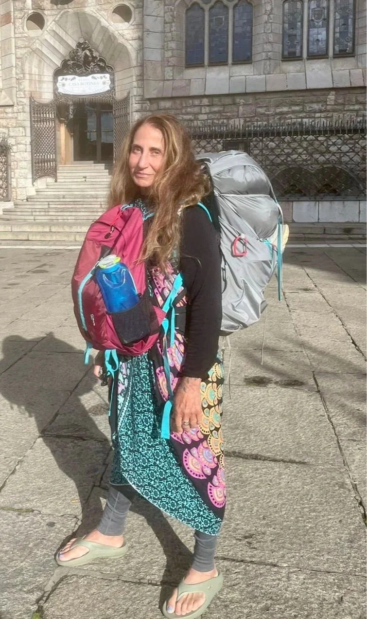 Lauren Kessler photo walking the camino with backpack on