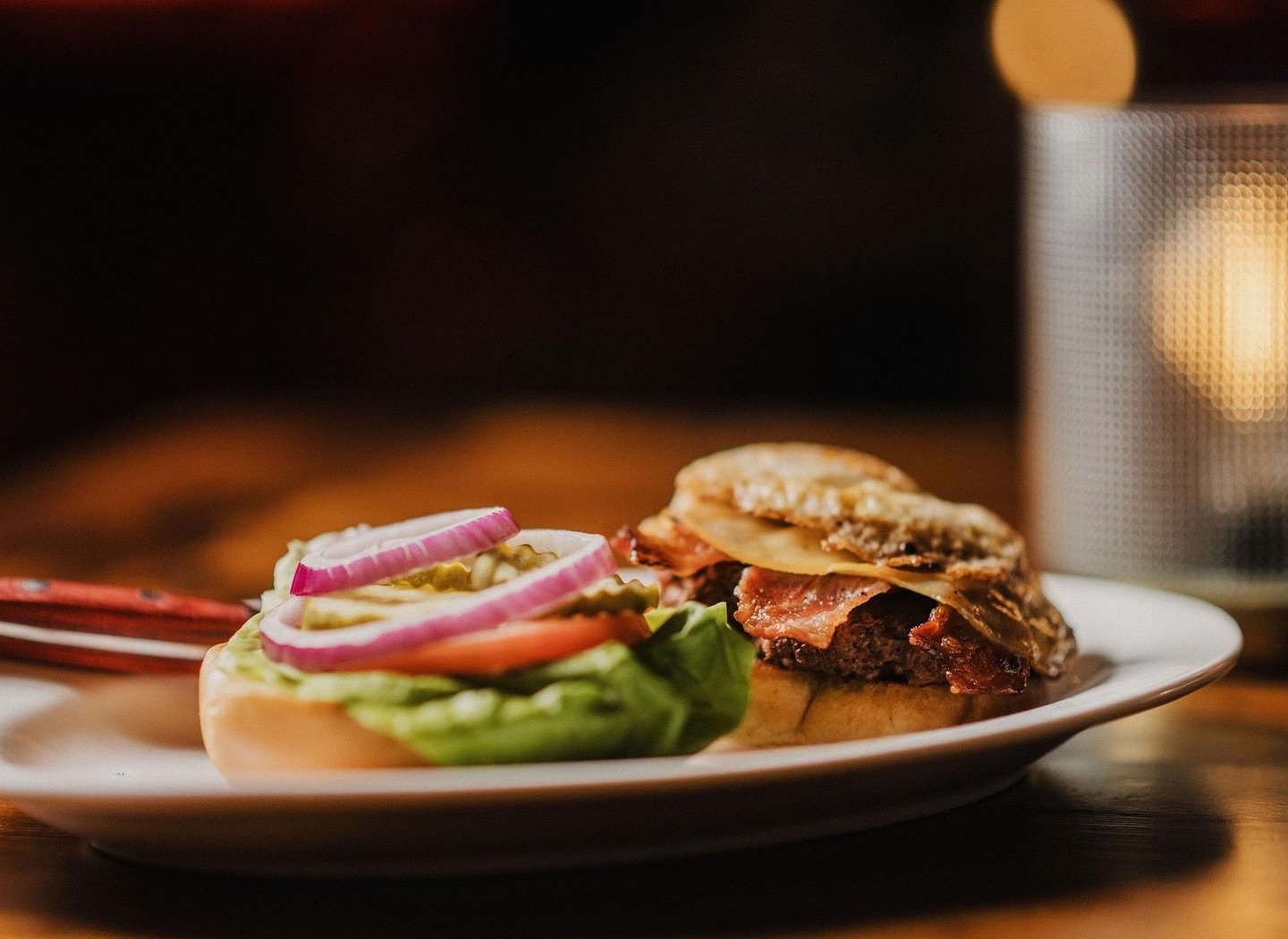 Not your typical bar food! 🍔 Our Beast Burger is masterfully blended with bison and elk and topped with gouda cheese, crispy bacon, and an over easy egg. It pairs perfectly with our new Parmesan Truffle Fries! 

📲 View our dinner menu at brownscorn