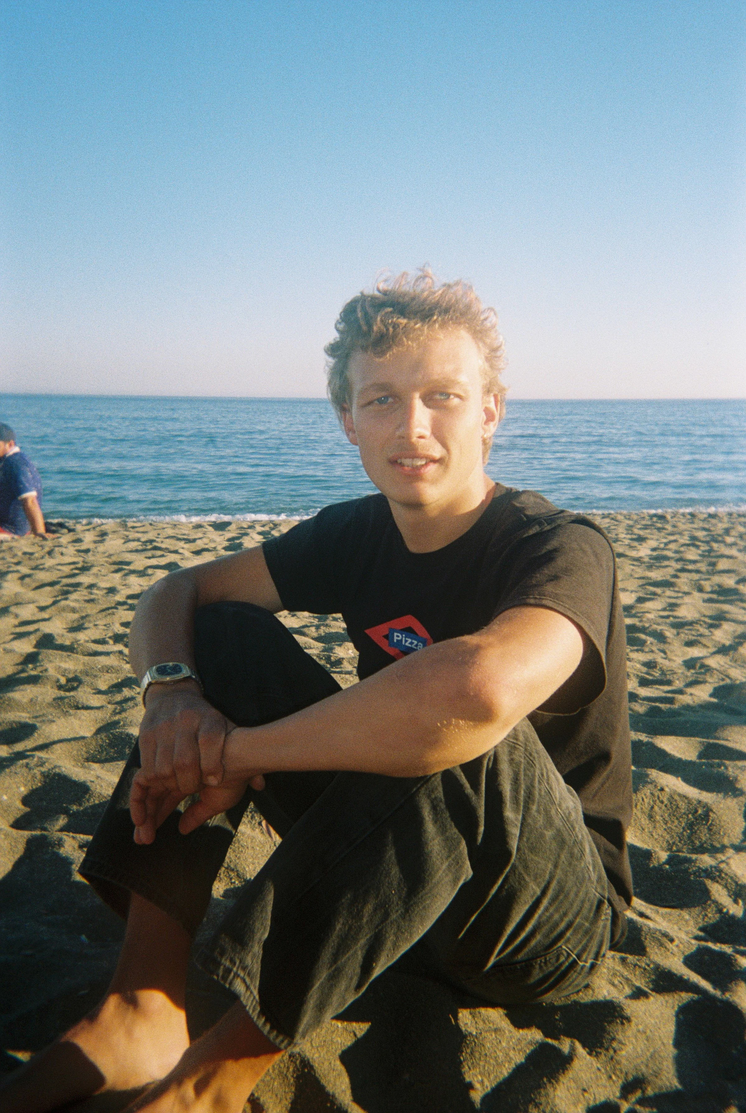 Arriving at the beach in Malaga. We are all tired from the day on the road and happy to lie down and make sandwiches and feel the sun. Sometimes the light hits David's eye at such an angle where the blue shines nearly translucent.
