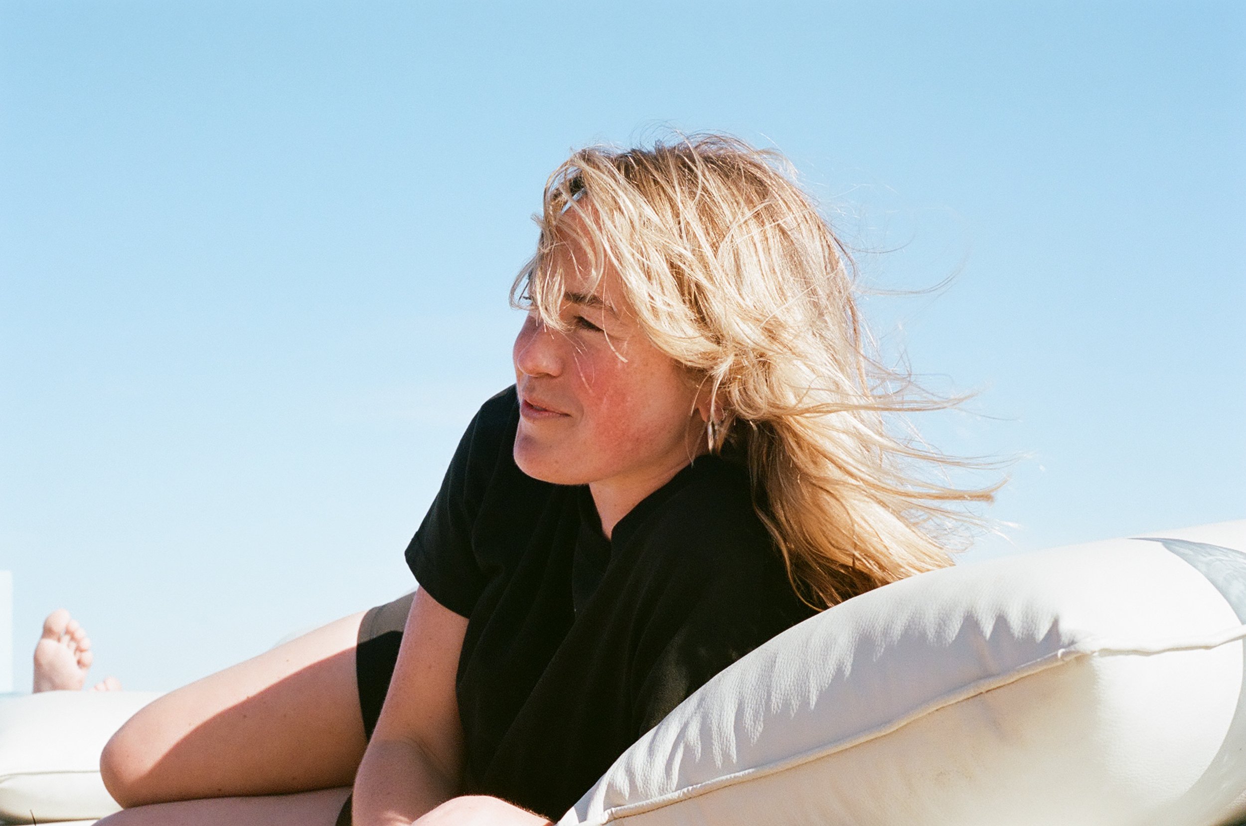 Relaxing with Mer as listen to music on the roof. I spent so much time on this roof but it felt like heaven it was perfect. And after so long on the road it was nice to relax. 