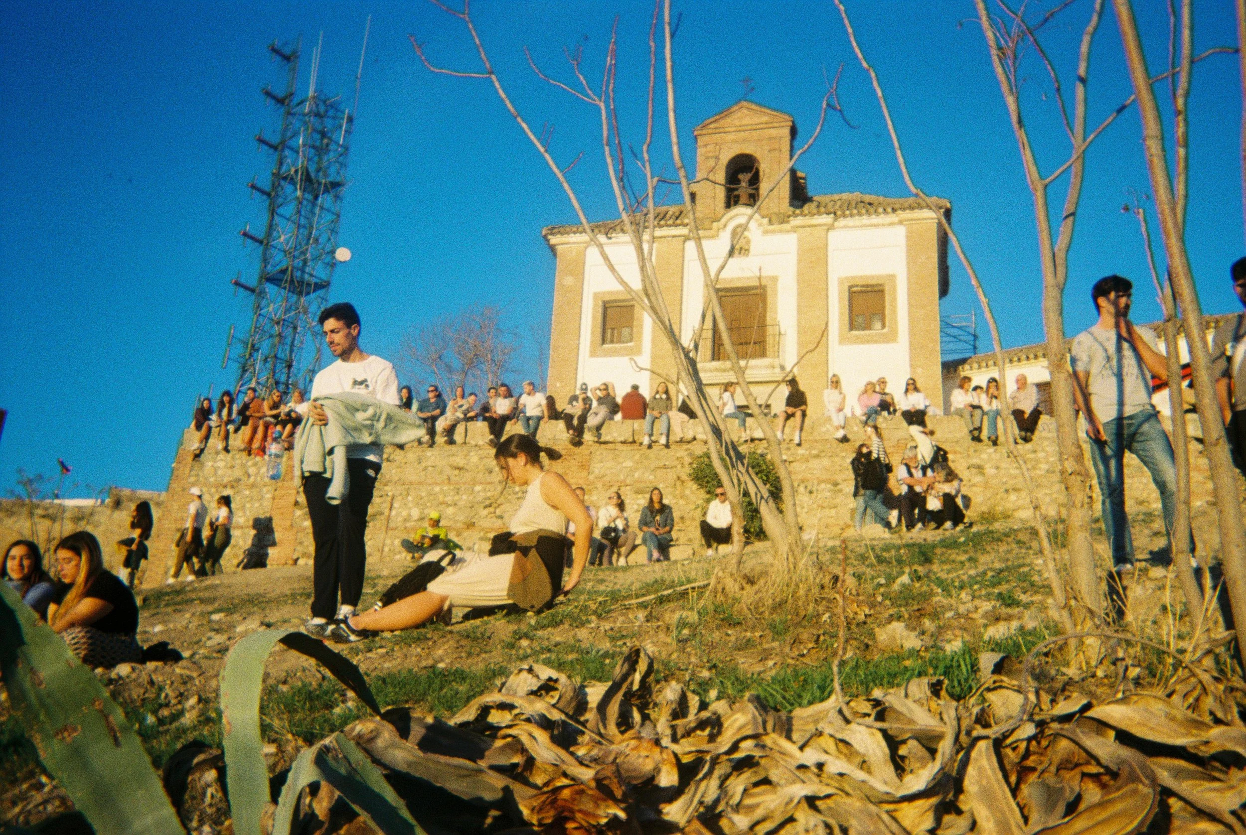 Every time I watch the sun set under the church in Granada I feel as though I'm on some island of misfit toys, watching the world as something outside of it. Nothing can touch me here, I move too fast and laugh too easy. Every sunset marks the end of