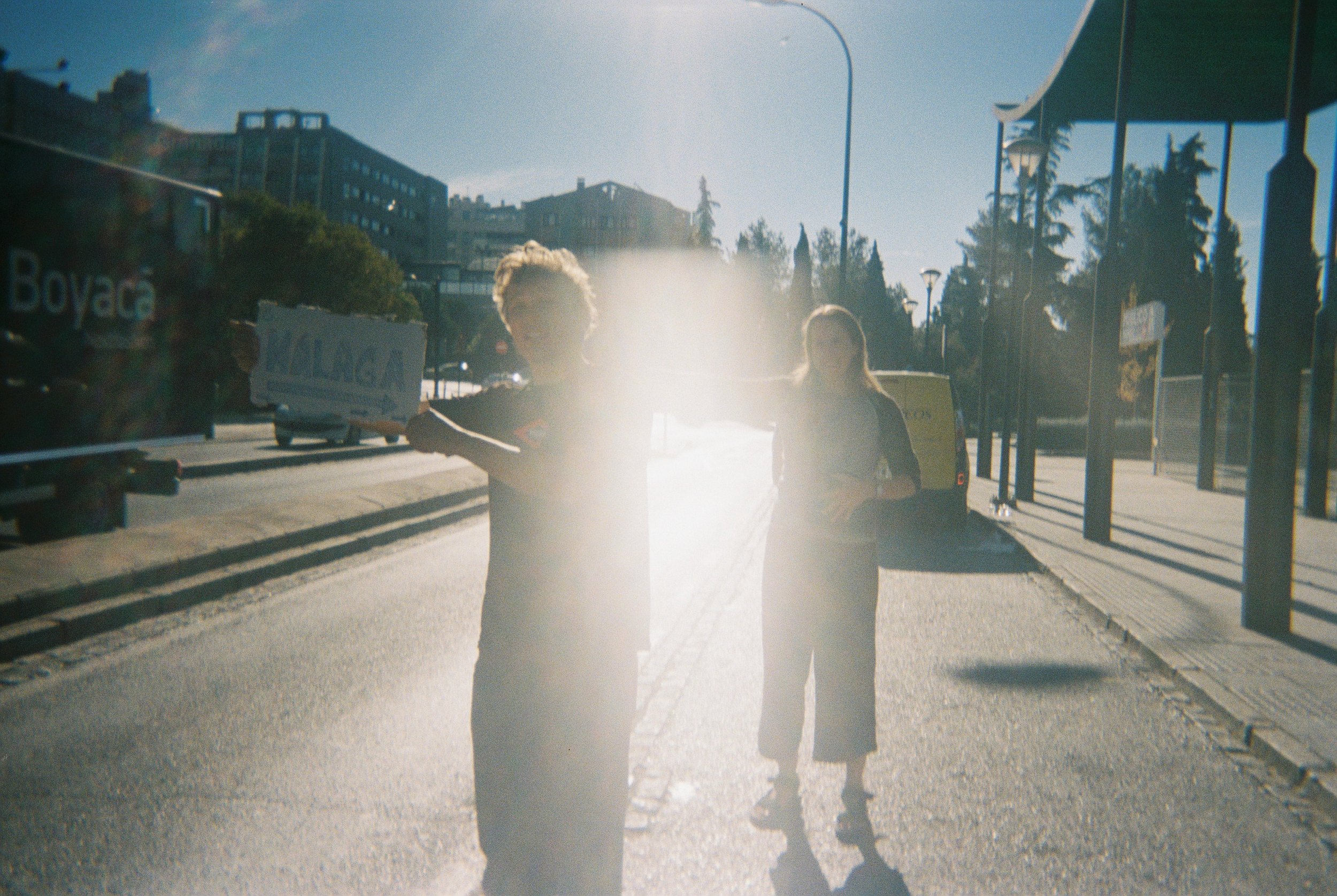 We end up changing spots because this was a place where blabla cars were pulling up, but we're having so much fun and acting silly and making the drivers smile. 