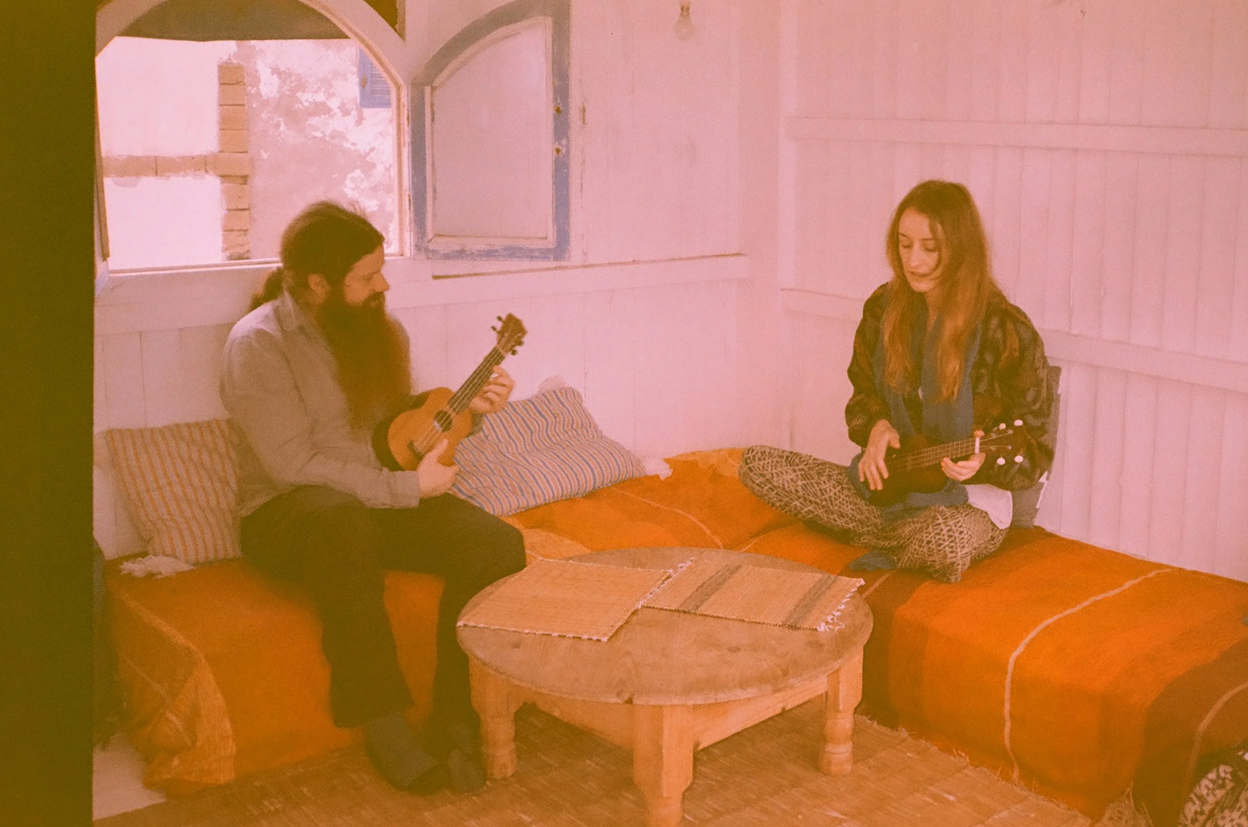 Myra and Rob are such sweethearts and we play songs while we wait for food.