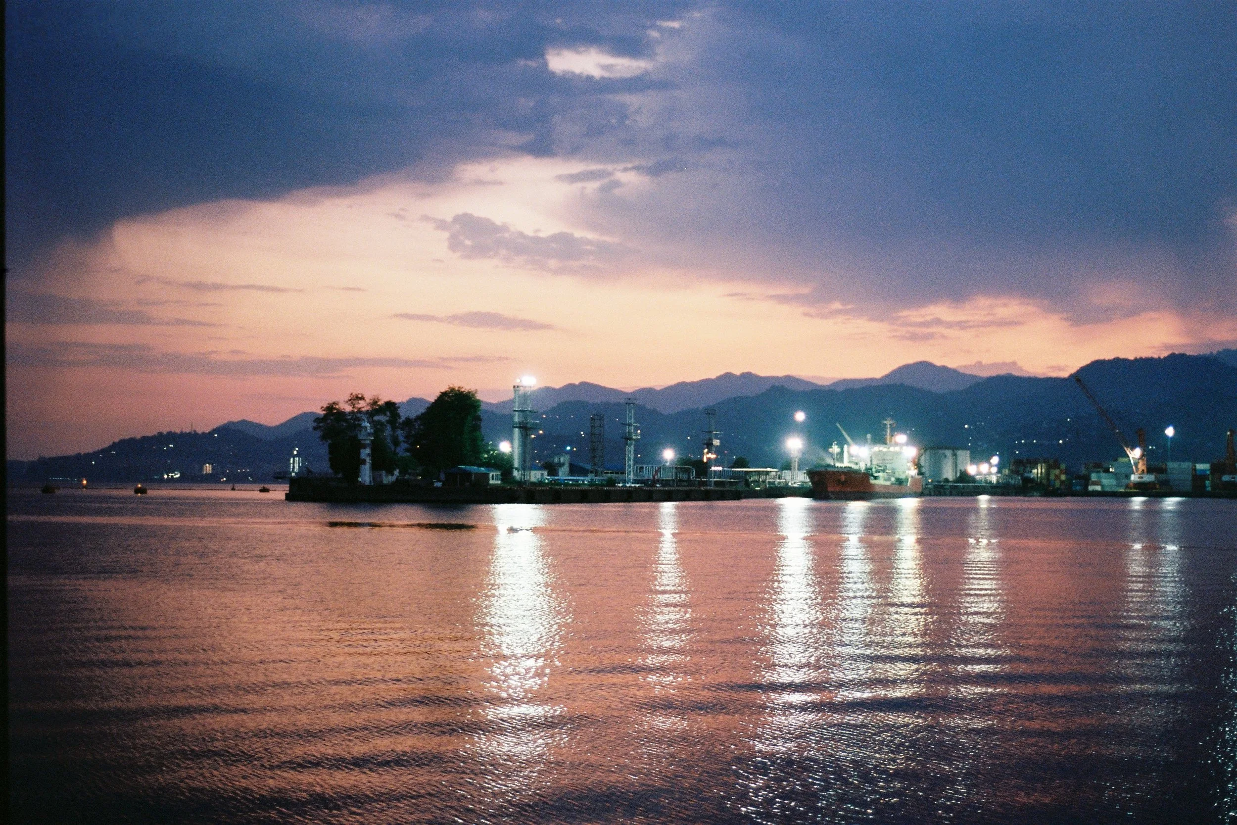 Nastya and I take an 8 hour busride through the night and arrive very early in the morning in Batumi. We sit at a closed restaurant by the water and watch the sunrise, exhausted and happy.