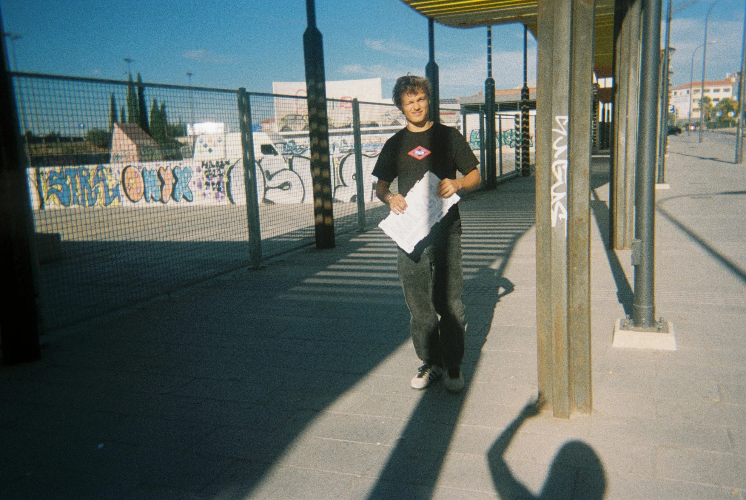 Starting to hitchhike from Granada to Malaga, we made a little sign and everything. 