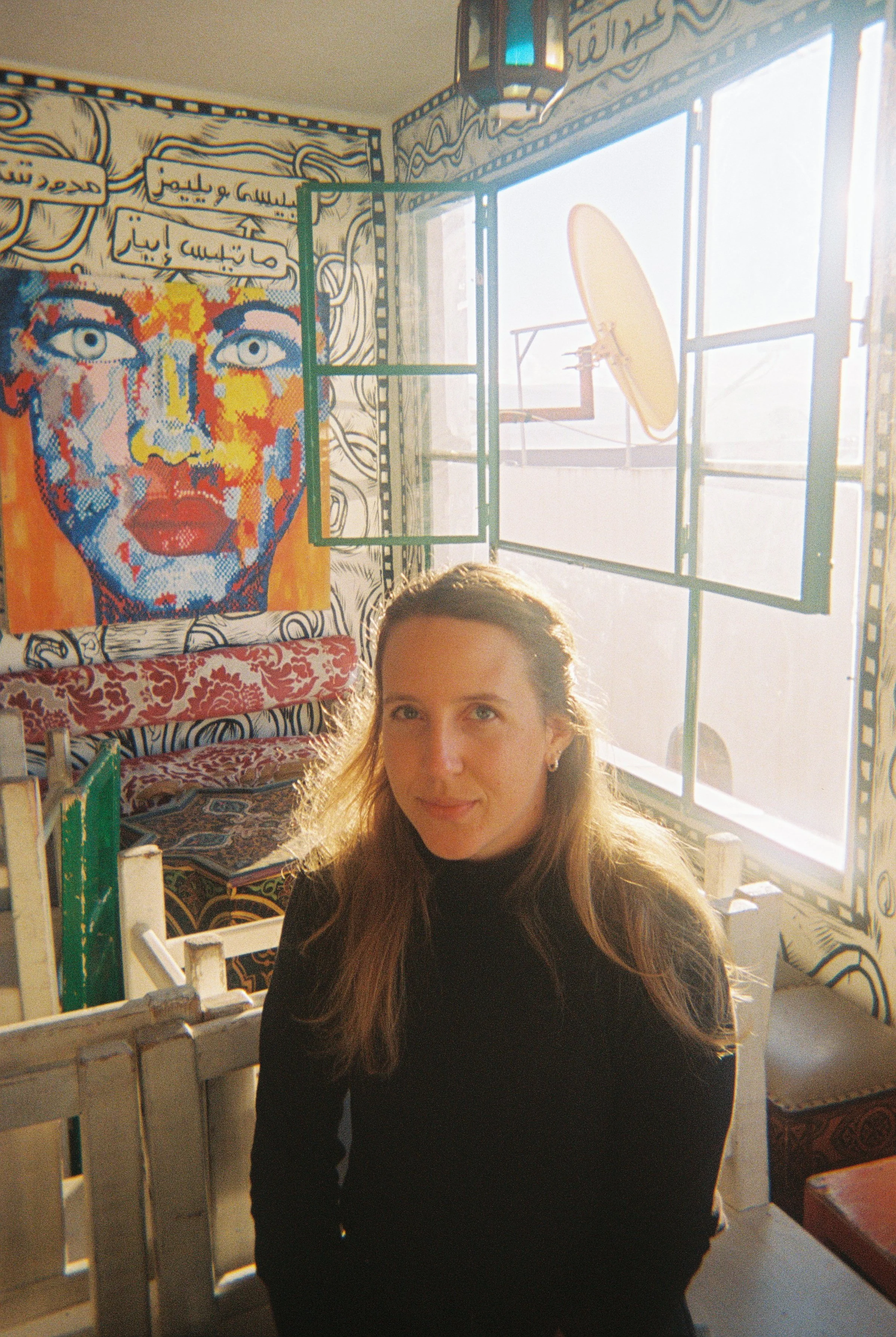 Taking Salome's portrait in the coffee shop. She is so beautiful. 