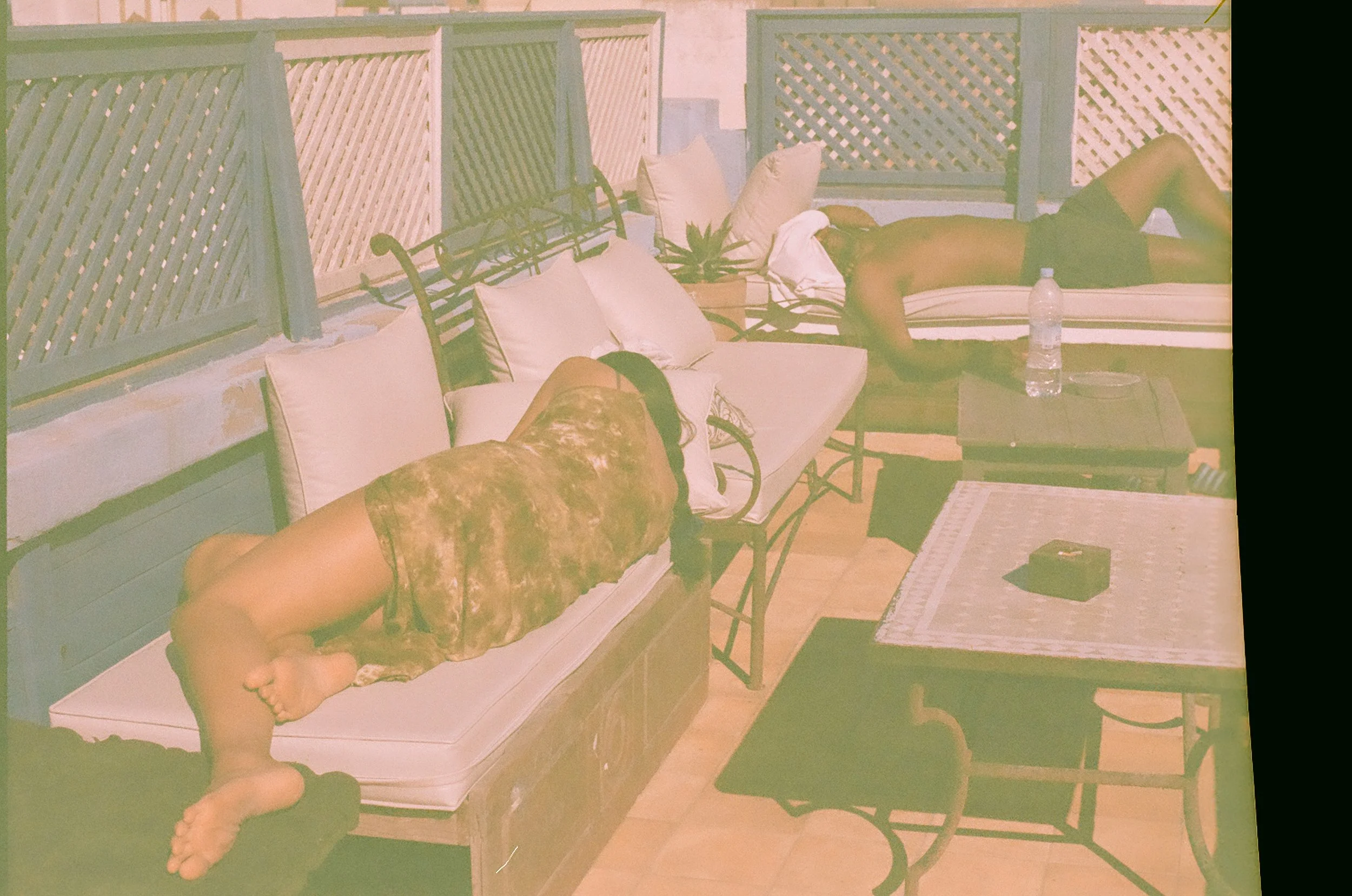 Sleepy backpackers on the roof of the hostel. This picture reminds me of a Gauguin painting. 