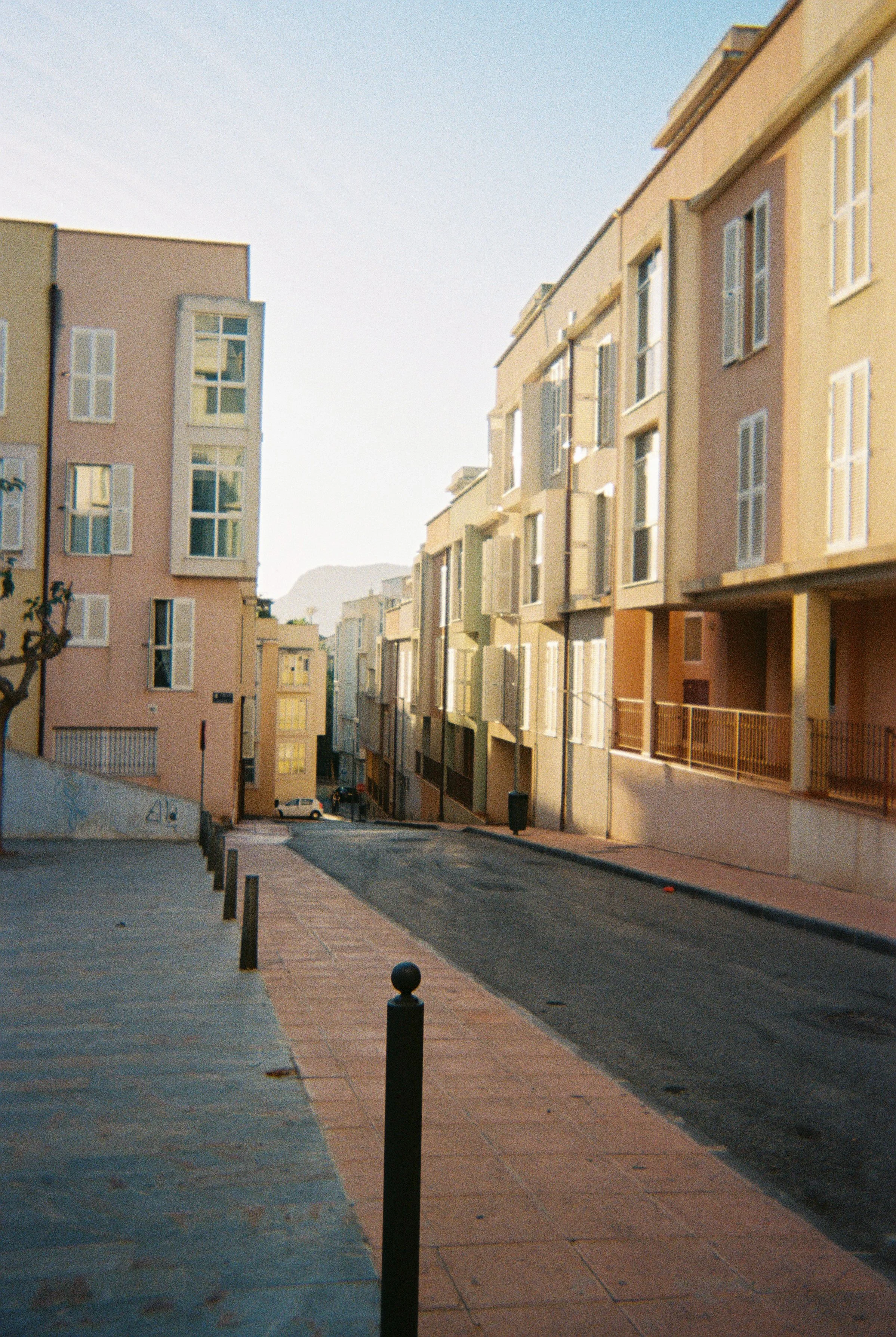 Outside of the hostel in Cartagena. The pastel streets are always empty but I can see people peaking from the windows sometimes. The light is getting warm and the shadows long.