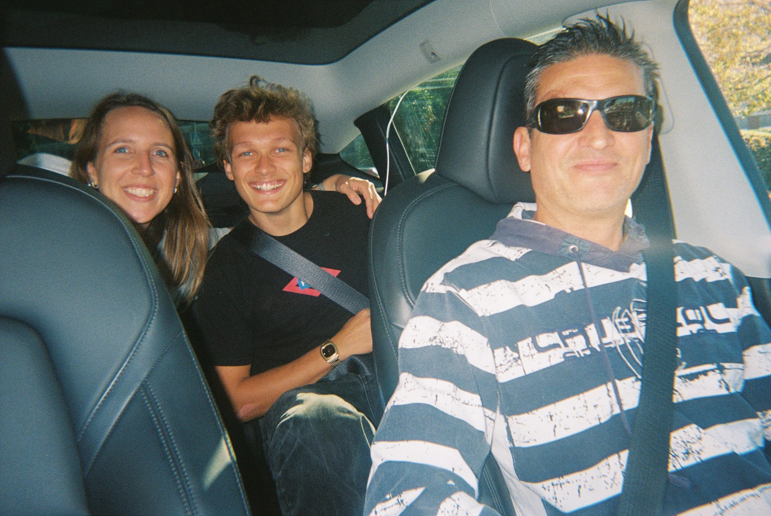 Success! This man drives us all the way to Malaga, right by the beach. He drives a Tesla and shows us how you can drive without touching the steering wheel if you clamp on little things to the wheel to make the car think your hands are on it. He spee