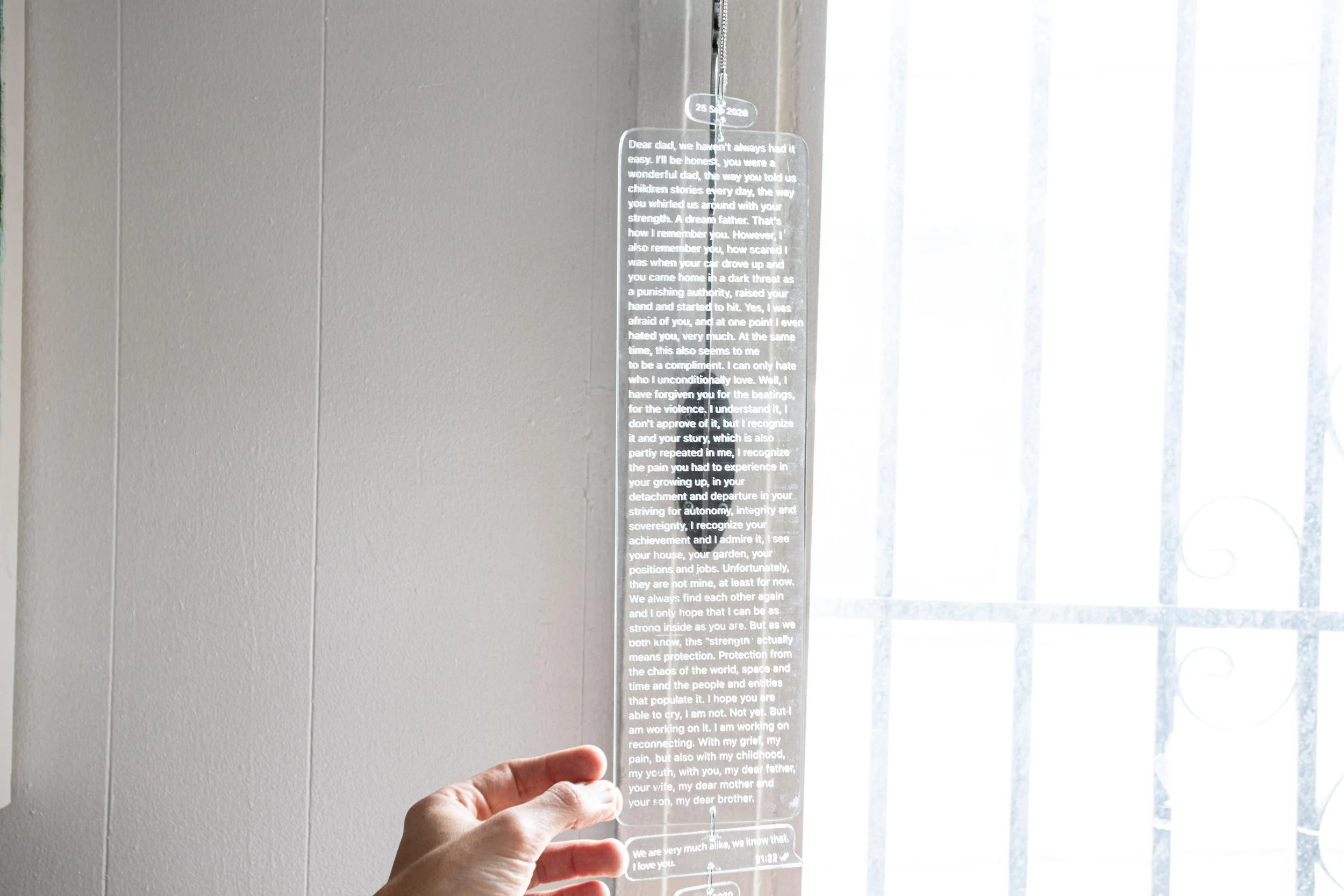 Repeat, 2026
steel, engraved glass, ceramic, 85cm x 34cm x 10cm


2

Repeat is a wall-mounted sculpture composed of a steel branch, suspended engraved glass plates, and a ceramic apple. The glass carries a message written by the artist to his father 