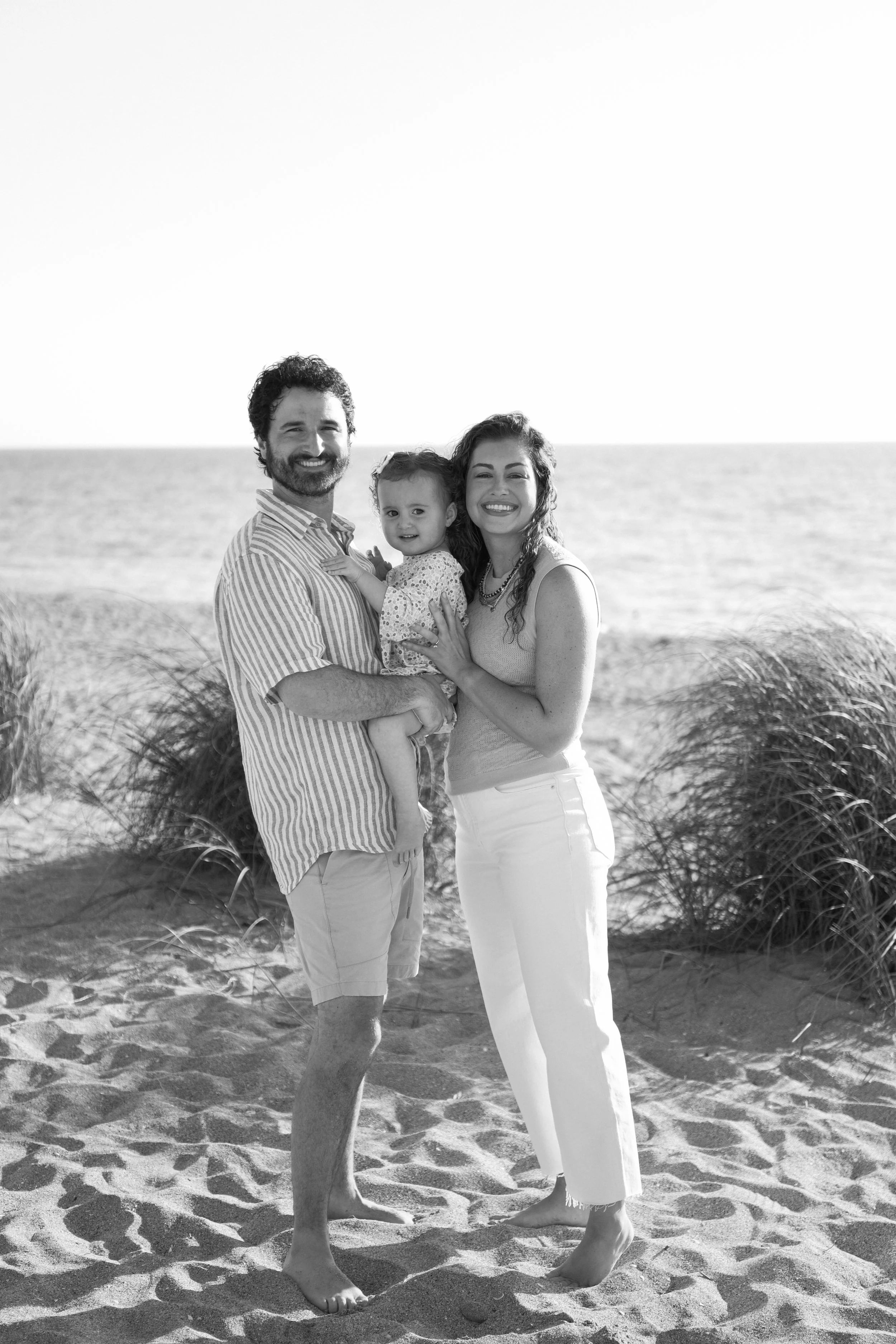 family-beach-photoshoot-venice-florida-standing-black-and-white2.jpg