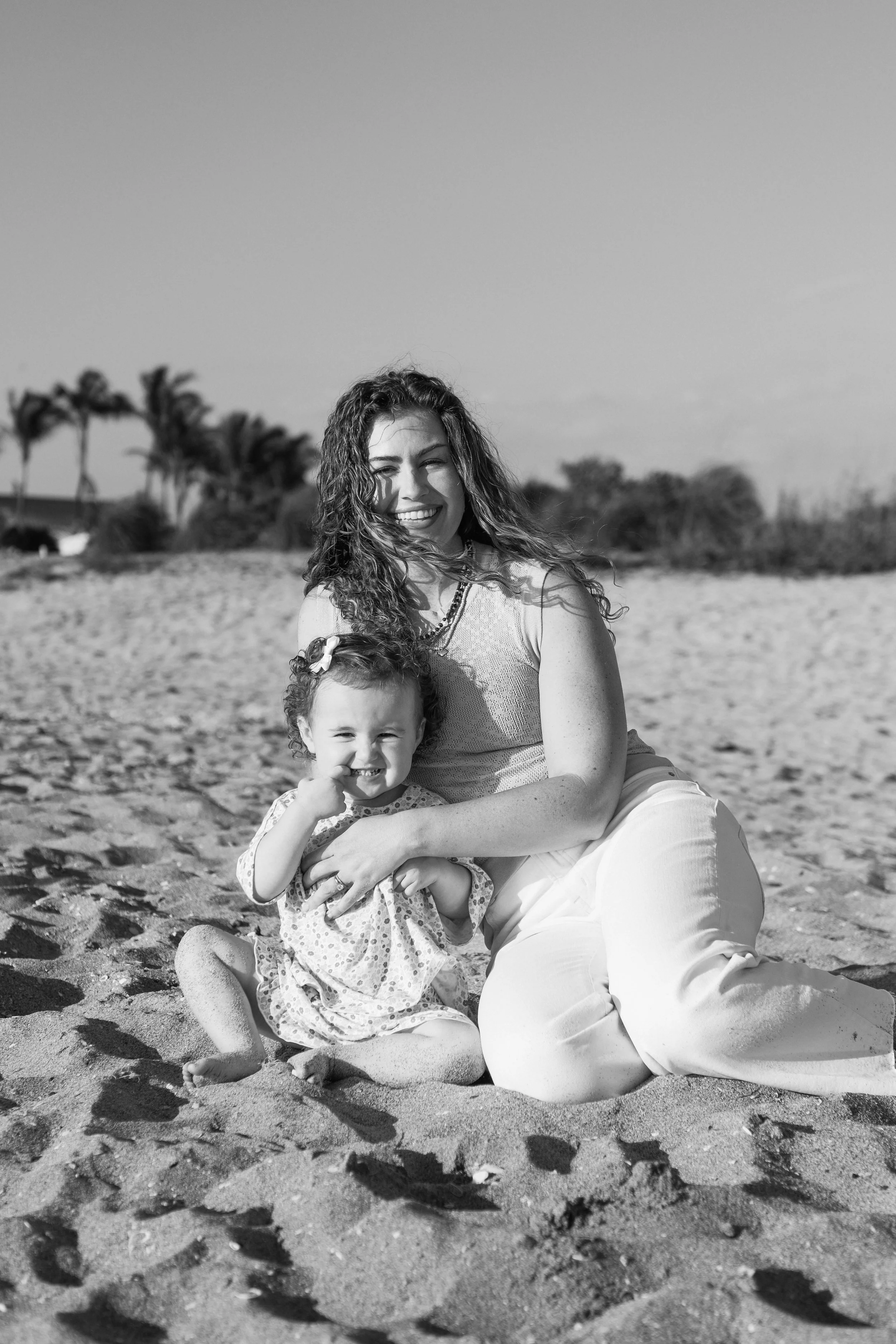 mother-child-beach-photos-venice-florida-sitting-sand-black-and-white.jpg