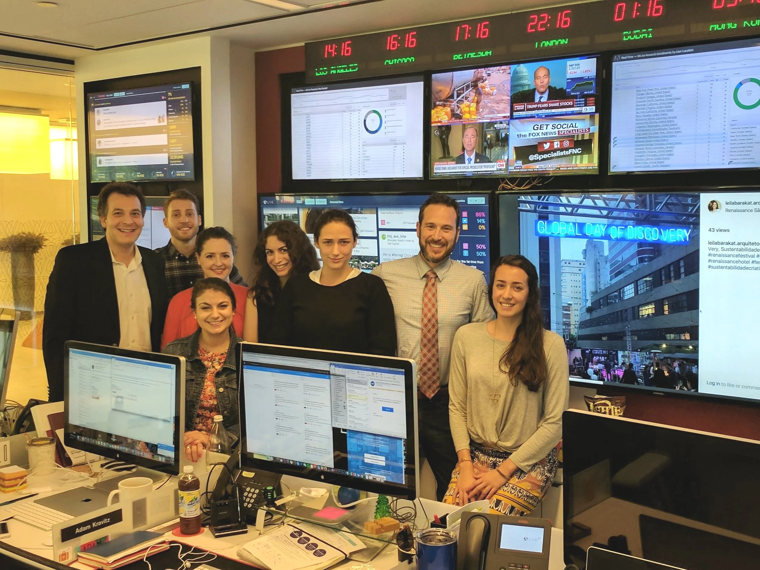 A team of creatives in a modern marketing command center