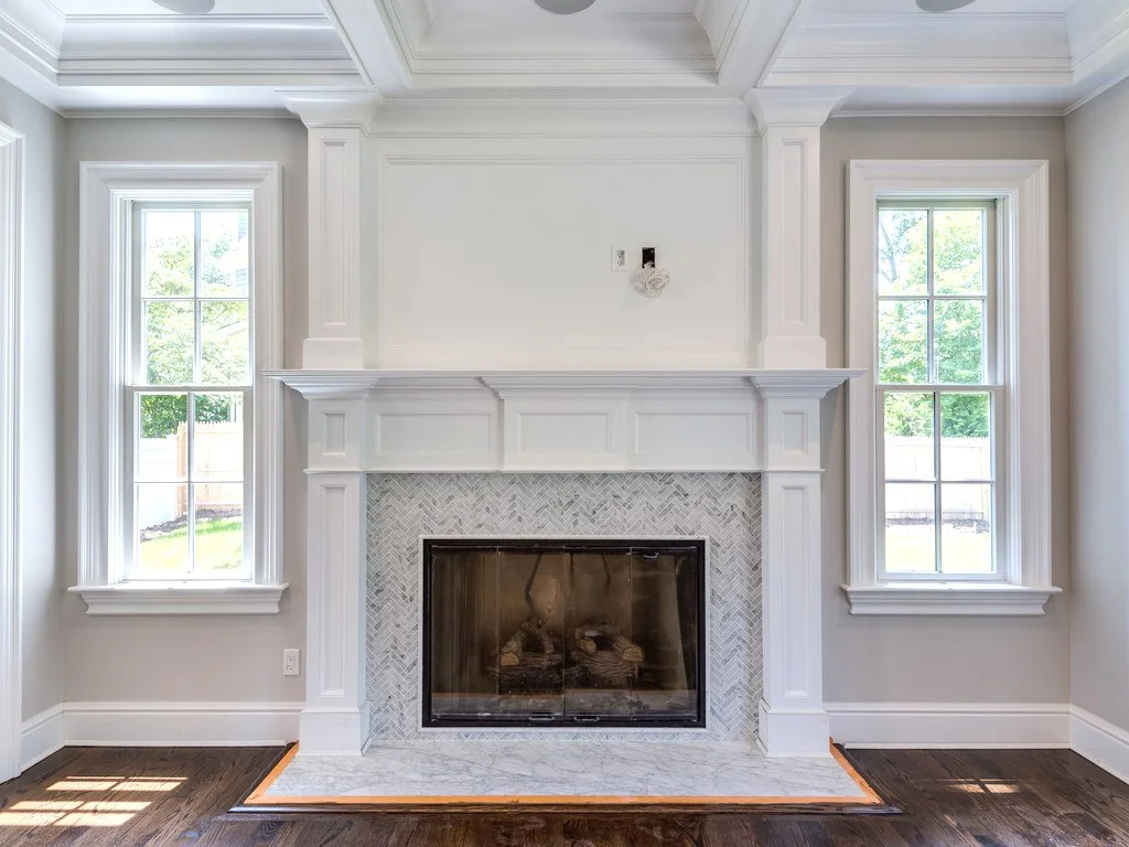 Springwood builders- herringbone fireplace tile.jpg