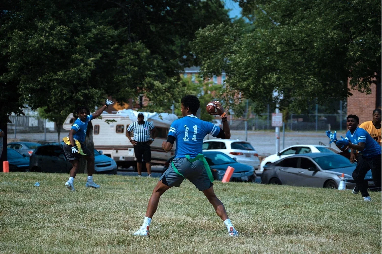 young men playing football