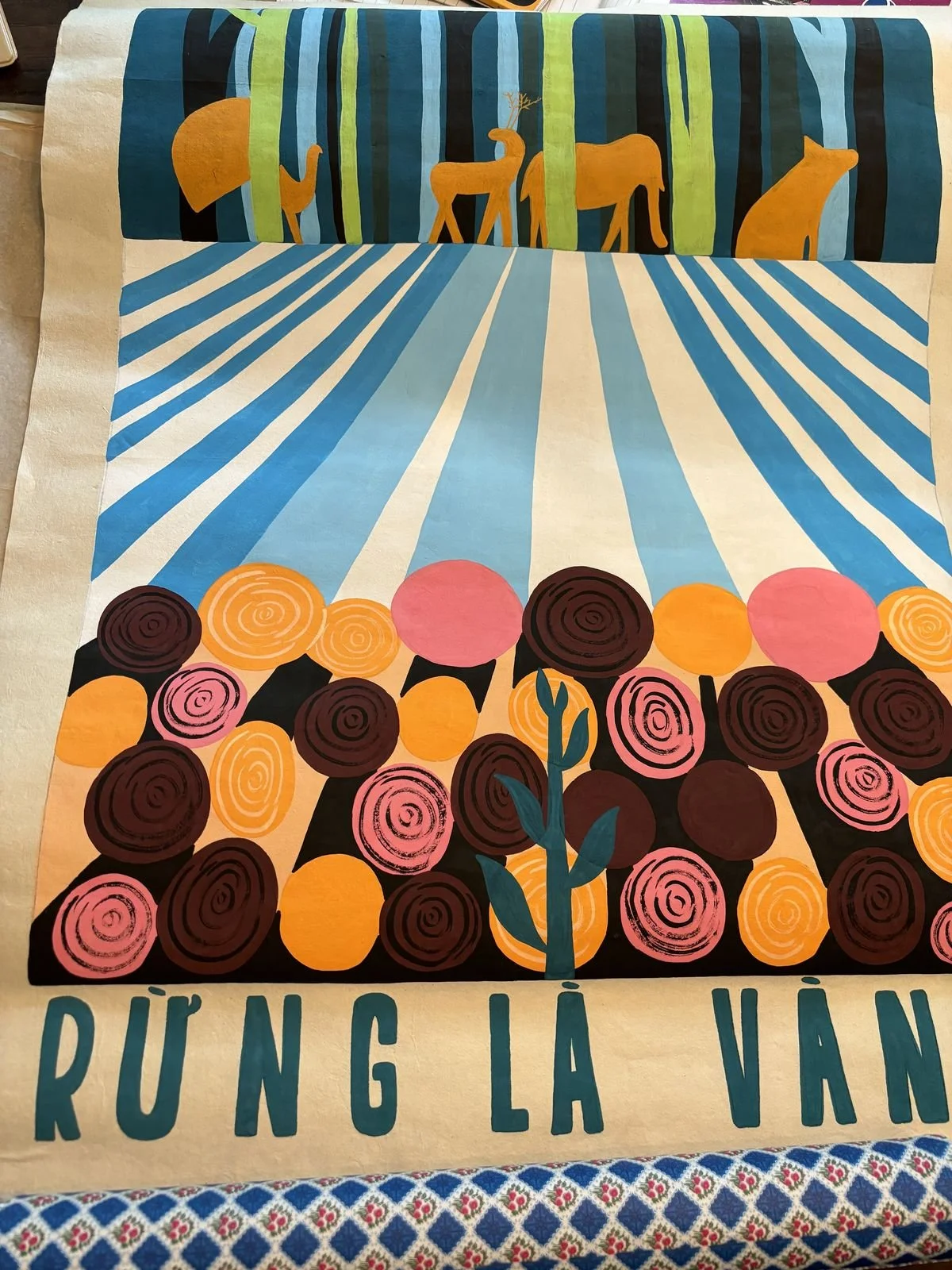 Colorful abstract painting featuring a forest scene with trees and animals, a field of flowers, and a background with blue and white rays and a phrase in Swedish, 'Rung Là Vän'.