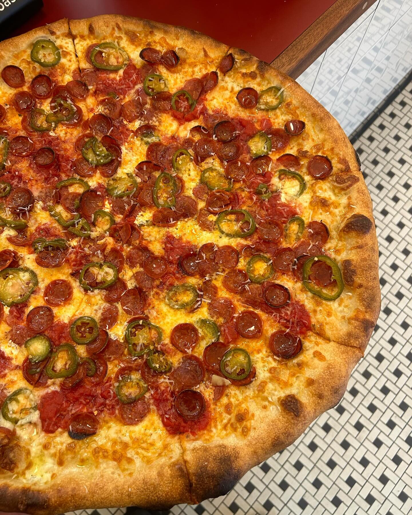 In the window today, Upside down with pepperoni, pickled Jalapenos and mikes hot honey. An homage to Orchard street. Come grab a slice &hearts;️🍕