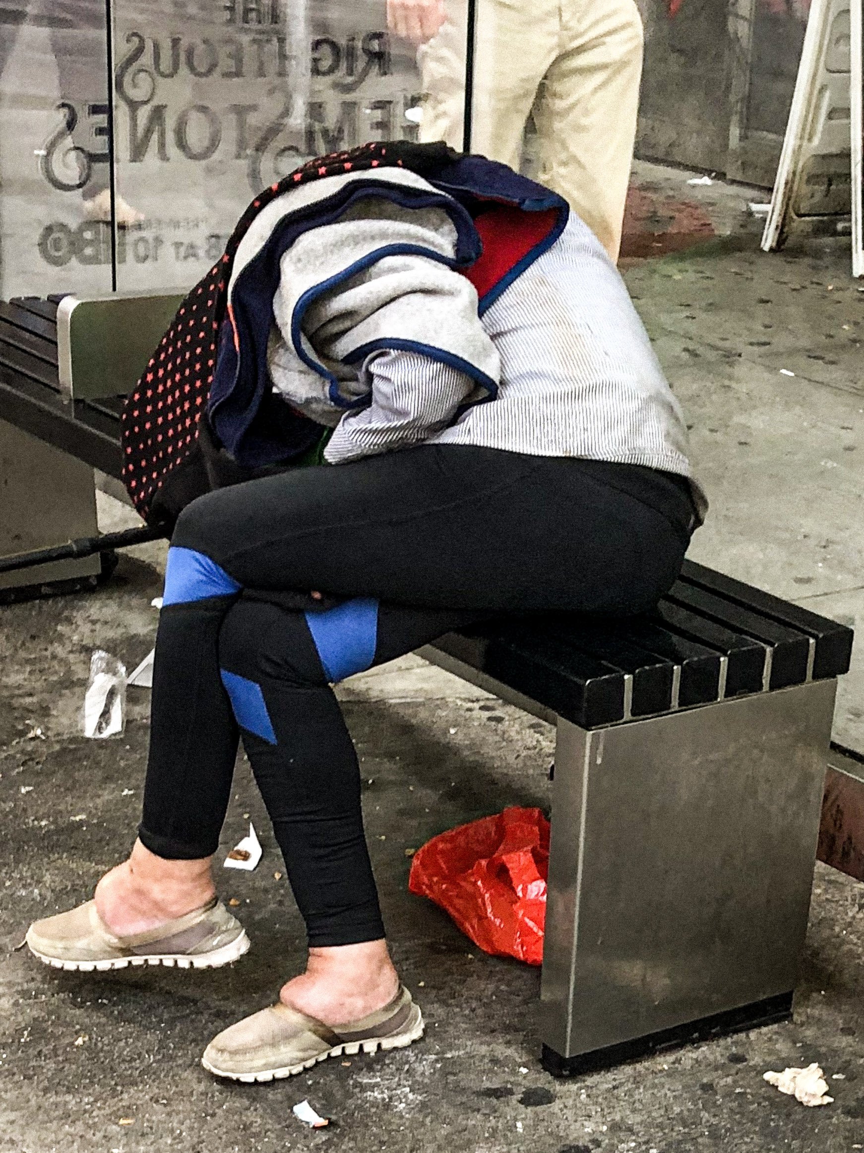 Sleeping at the bus stop