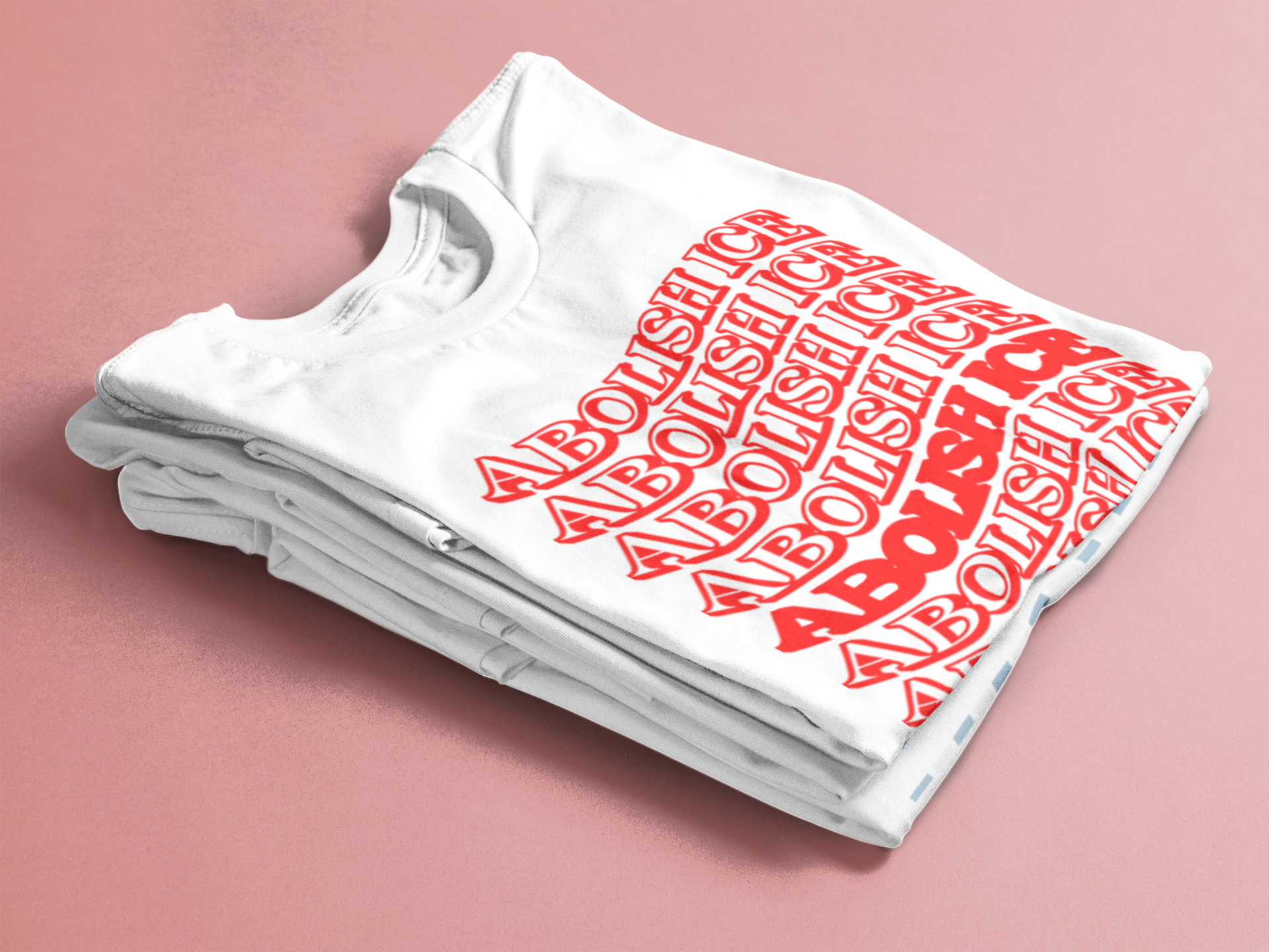 folded-t-shirts-mockup-over-a-flat-backdrop-6492a.png