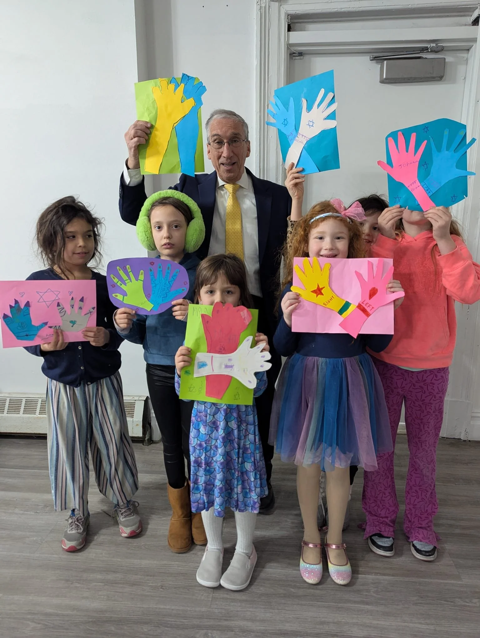 This Shabbat, we explored the parsha with some hands-on (pun intended) art. Morah Amelia taught us how blessings were given in the ancient world. Plot twist (literally): it wasn't the oldest kid who inherited the land. Guess how many little sibs were